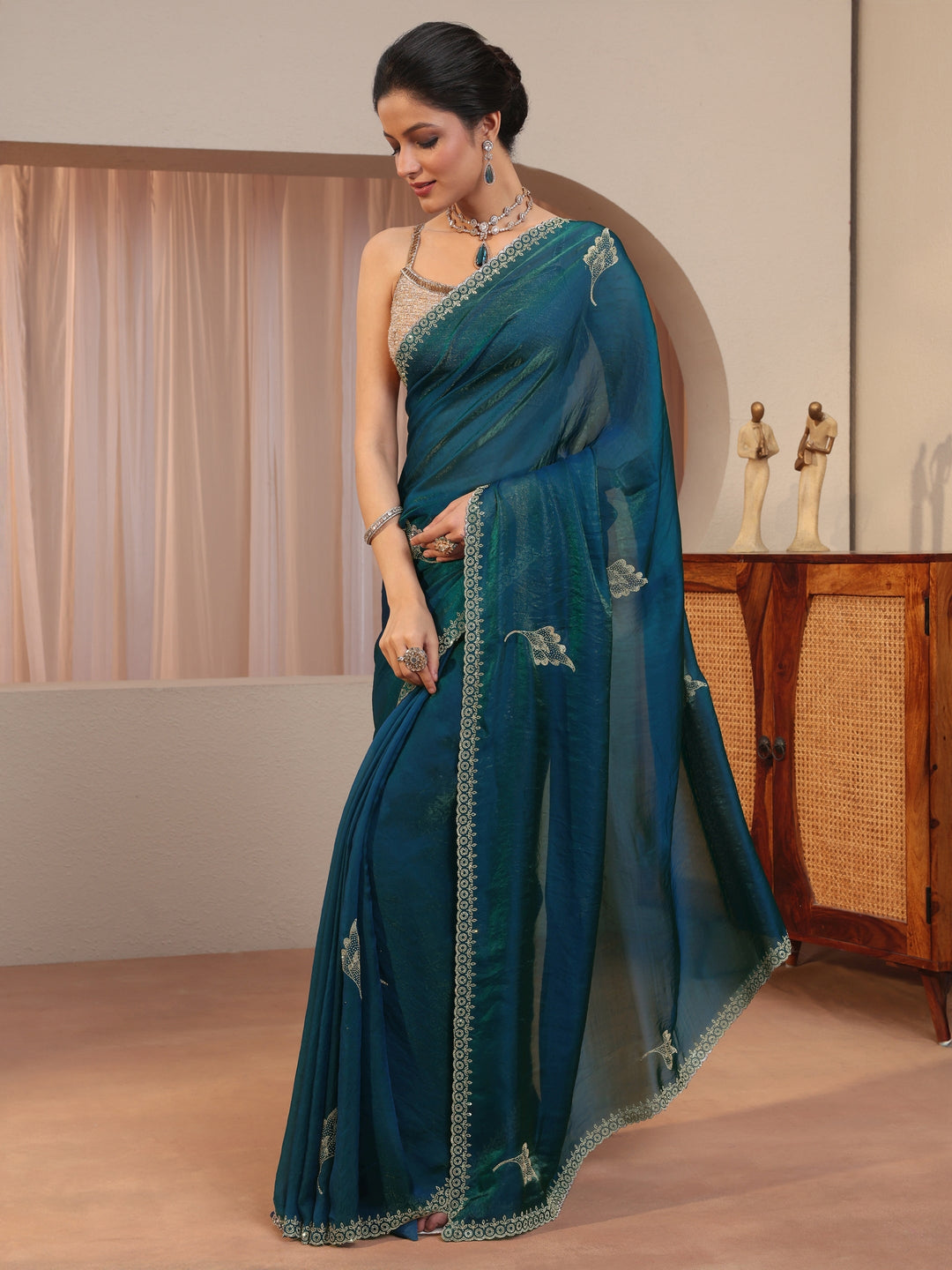  Peacock Blue Tissue Saree With Embellished Leaf Motifs 