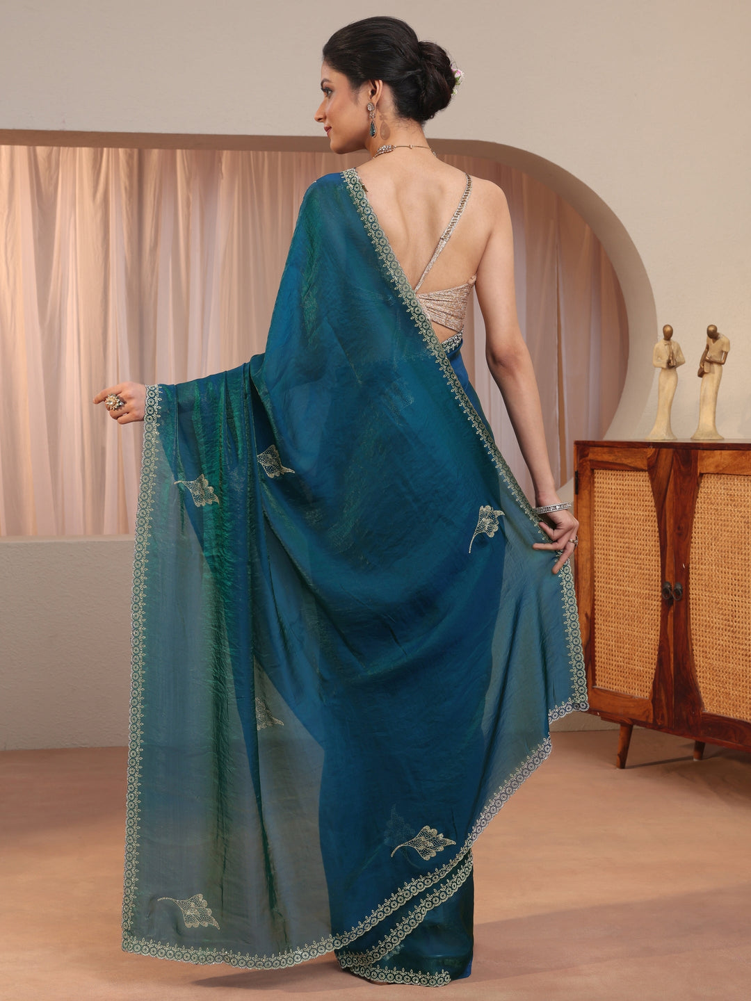  Peacock Blue Tissue Saree With Embellished Leaf Motifs 