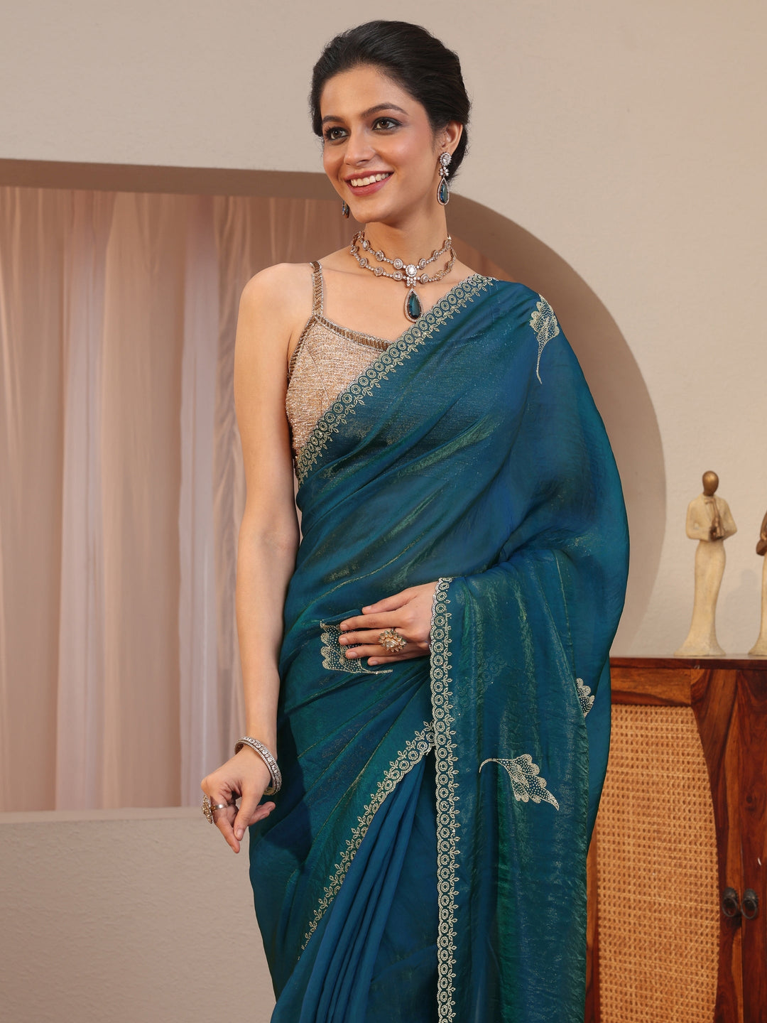  Peacock Blue Tissue Saree With Embellished Leaf Motifs 