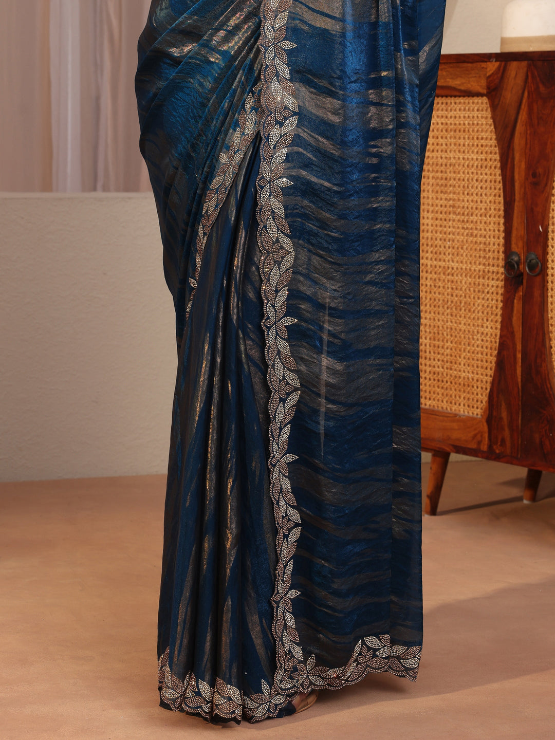  Blue And Golden Tissue Saree With Embellished Border 