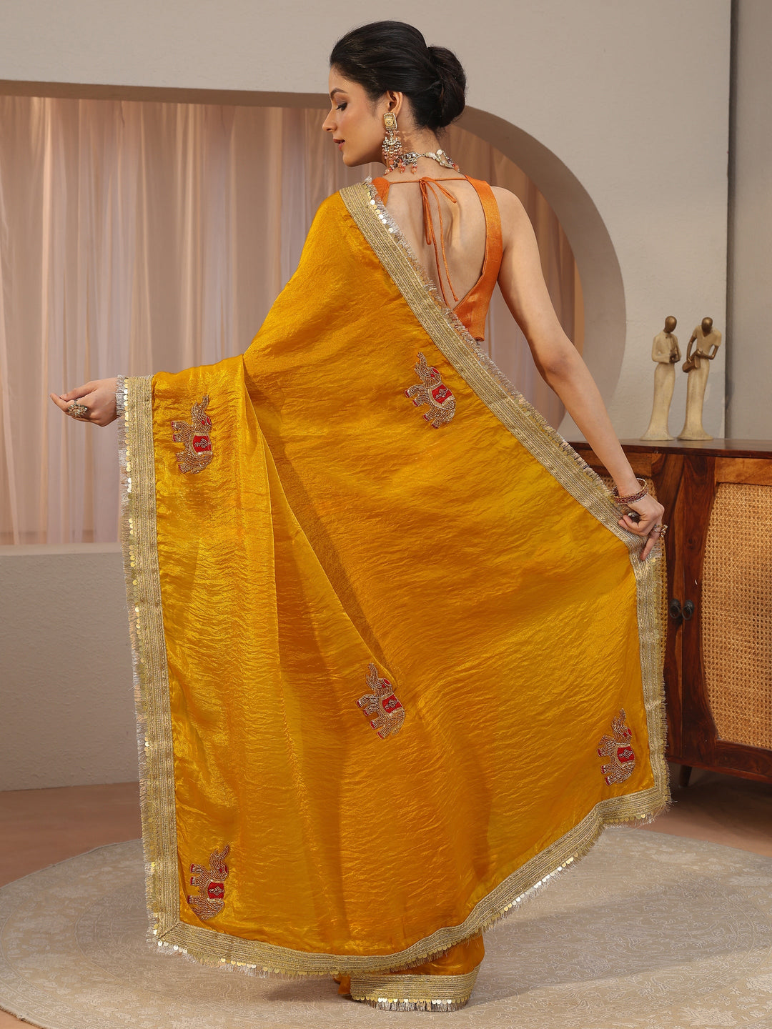  Mustard Embellished Elephant Motif Tissue Saree 