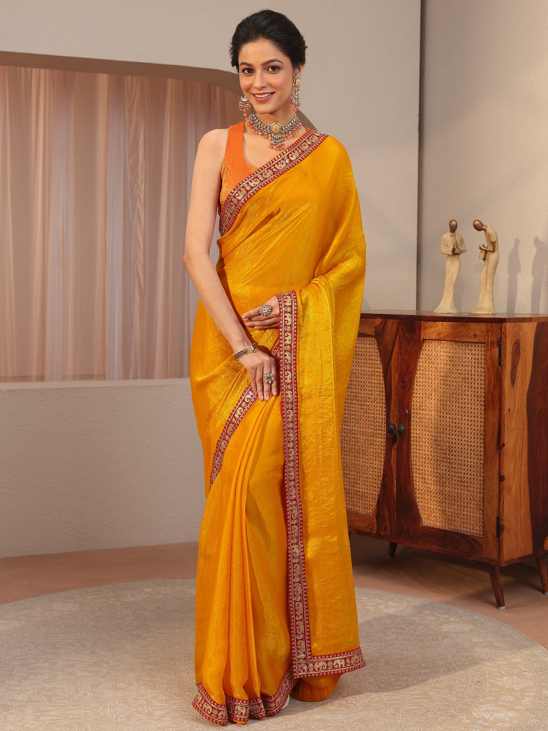  Mustard Tissue Saree With Embellished Border 