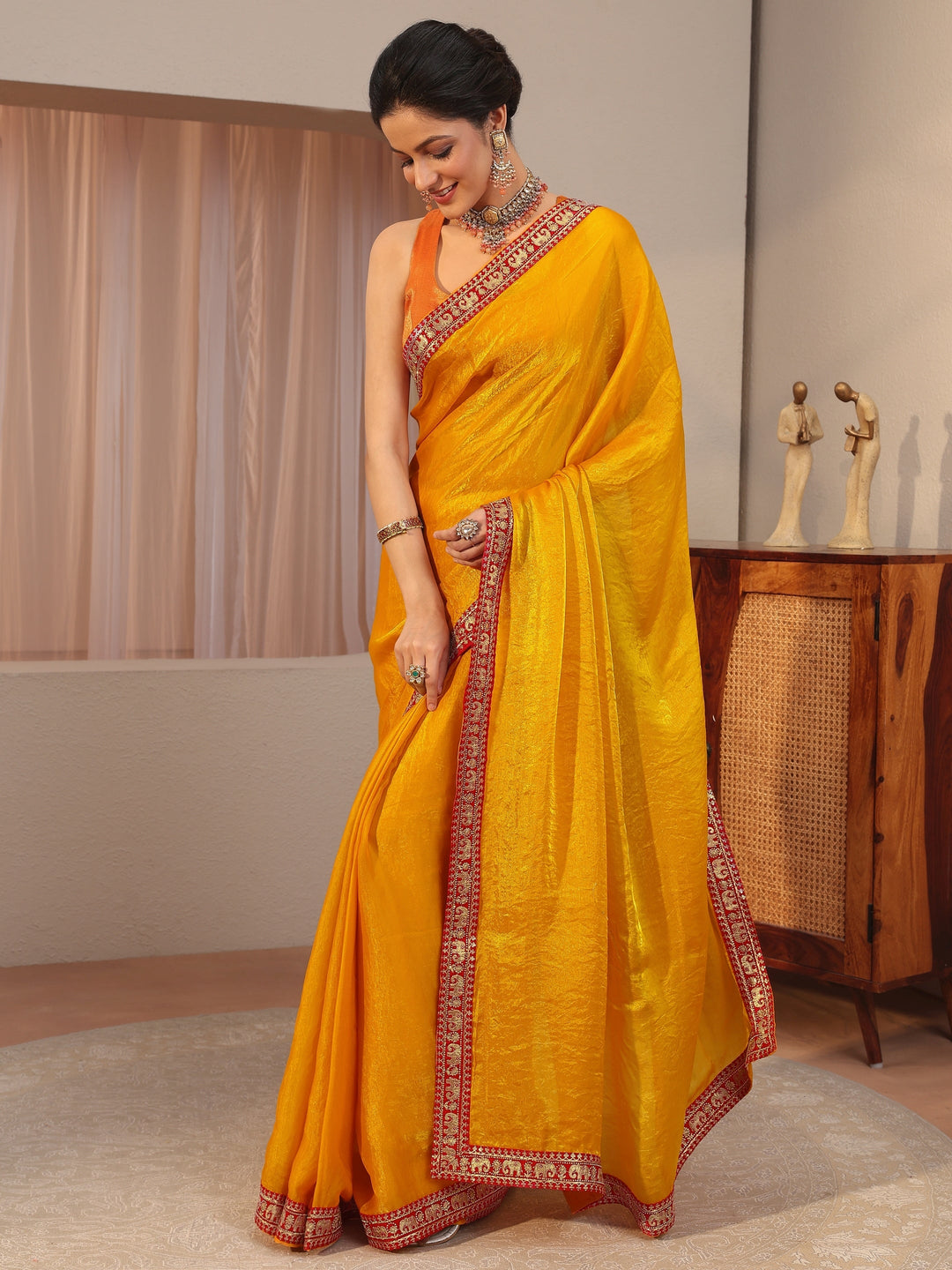 Mustard Tissue Saree With Embellished Border 