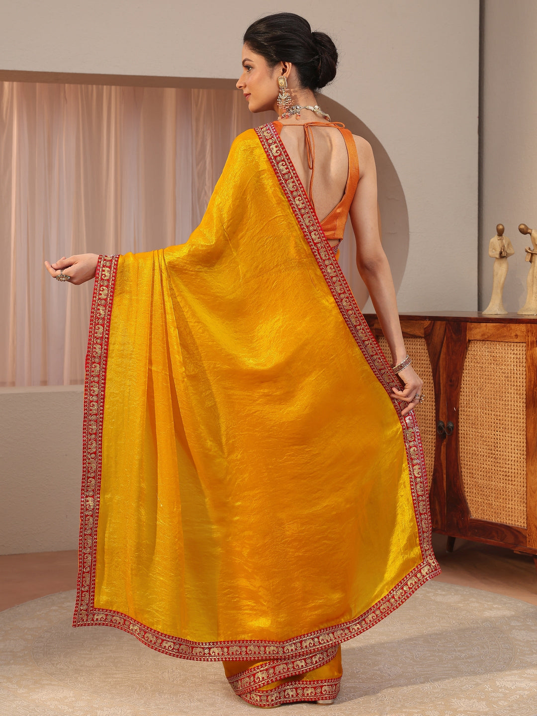  Mustard Tissue Saree With Embellished Border 