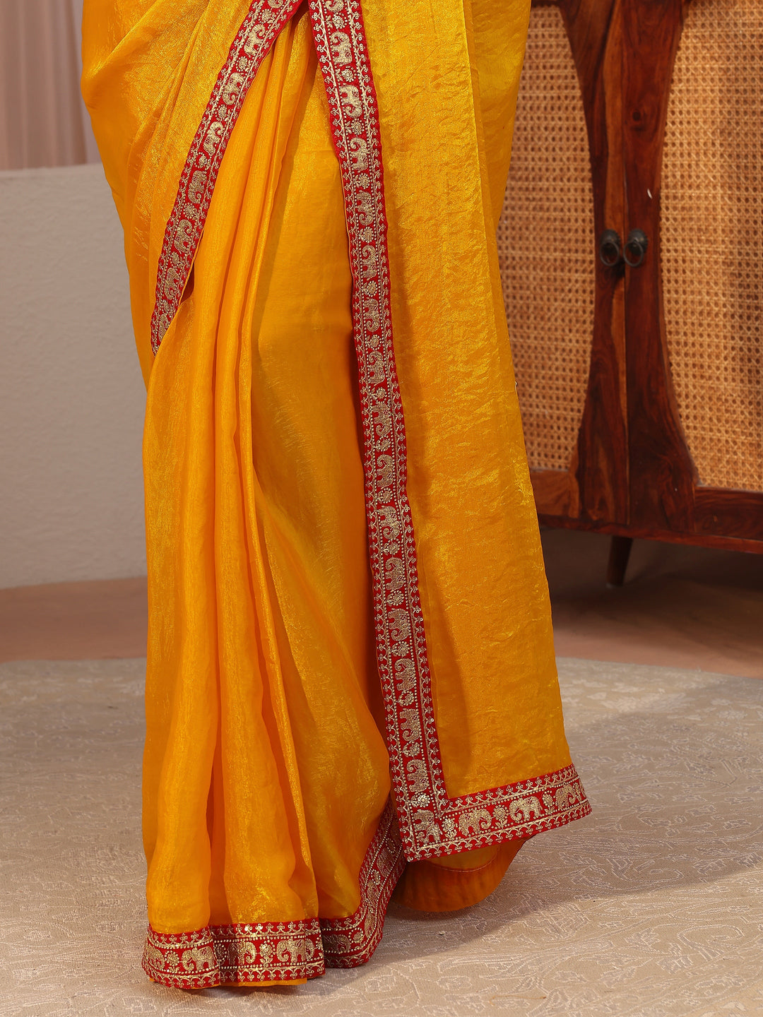  Mustard Tissue Saree With Embellished Border 