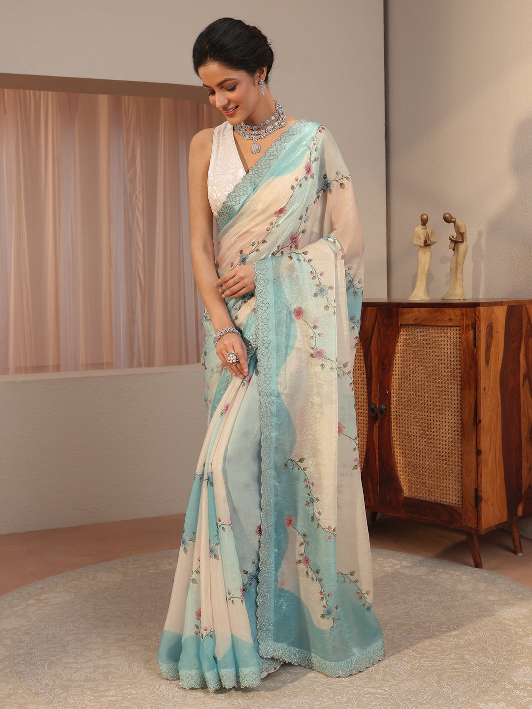  Baby Blue And Ivory Embellished Tissue Saree 