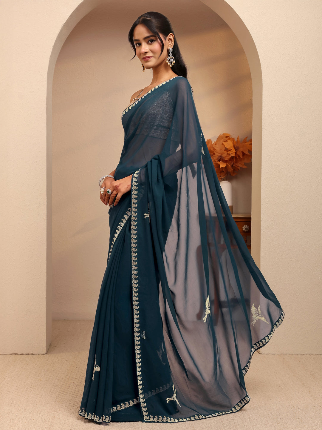  Teal Blue Georgette Saree 