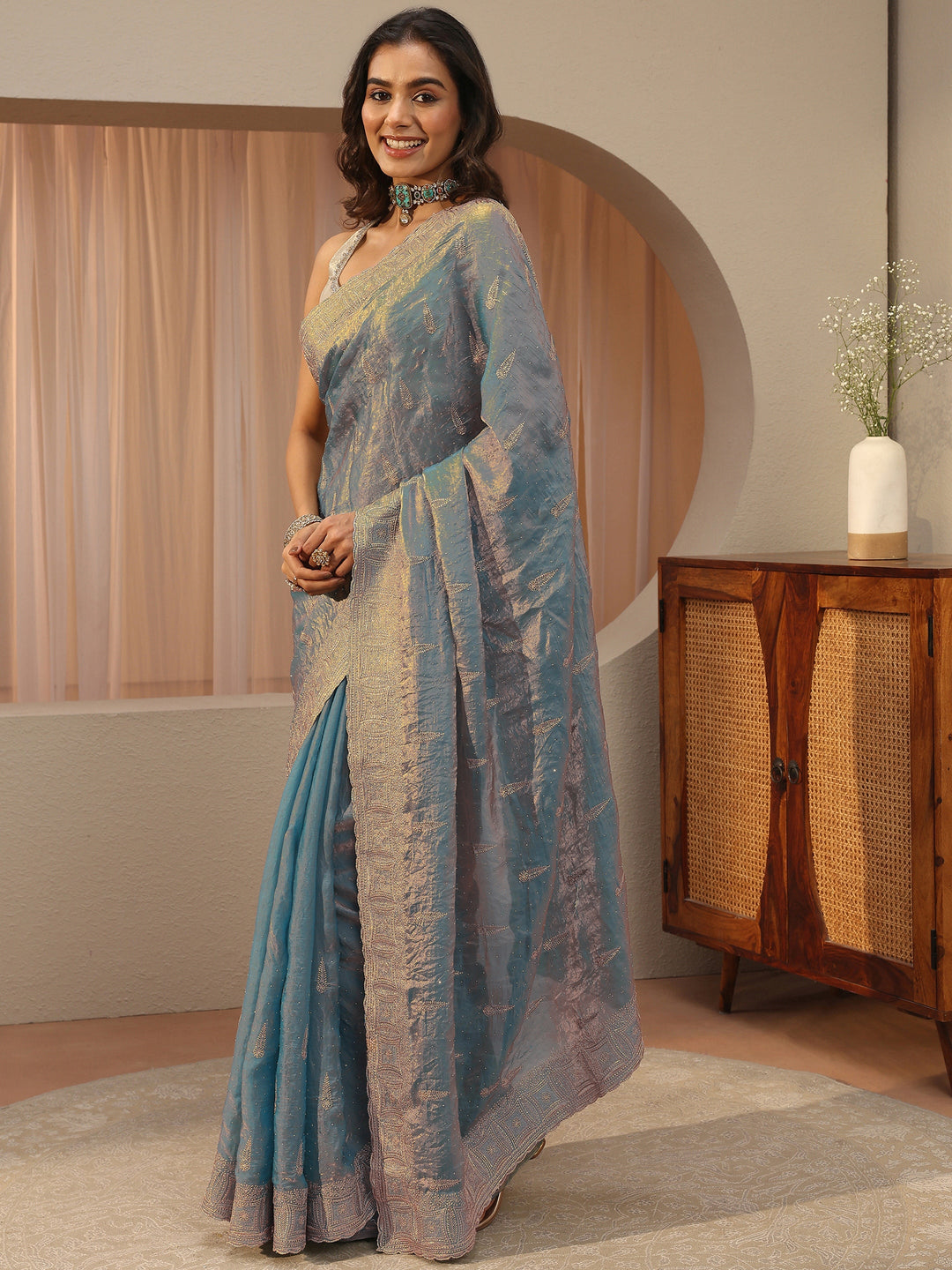  Powder Blue Ethnic Embellished Tissue Saree 
