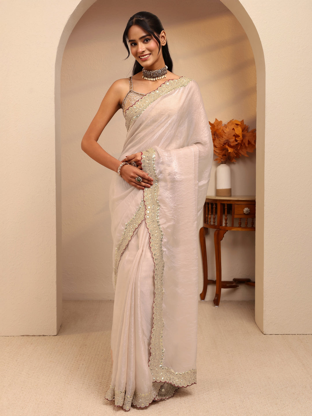  Cream Embellished Tissue Saree 