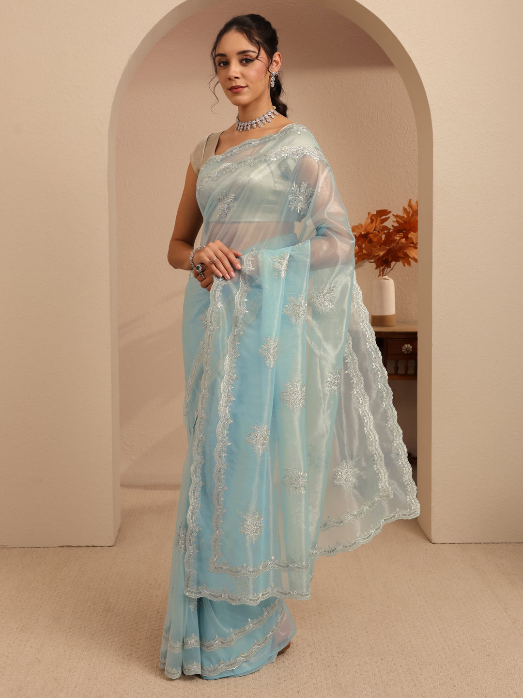  Powder Blue Floral Embellished Net Saree 