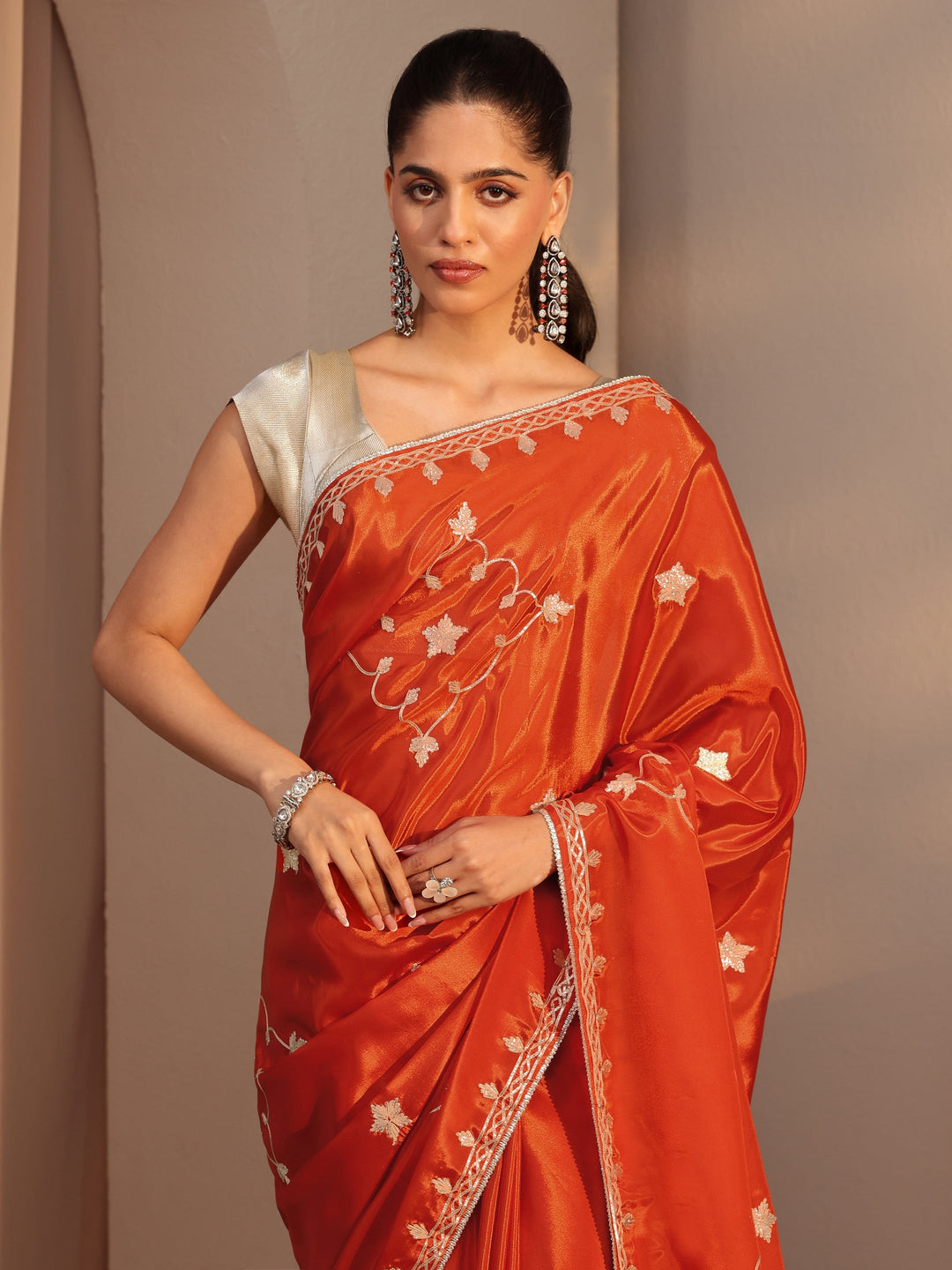  Orange Embellished Satin Saree 