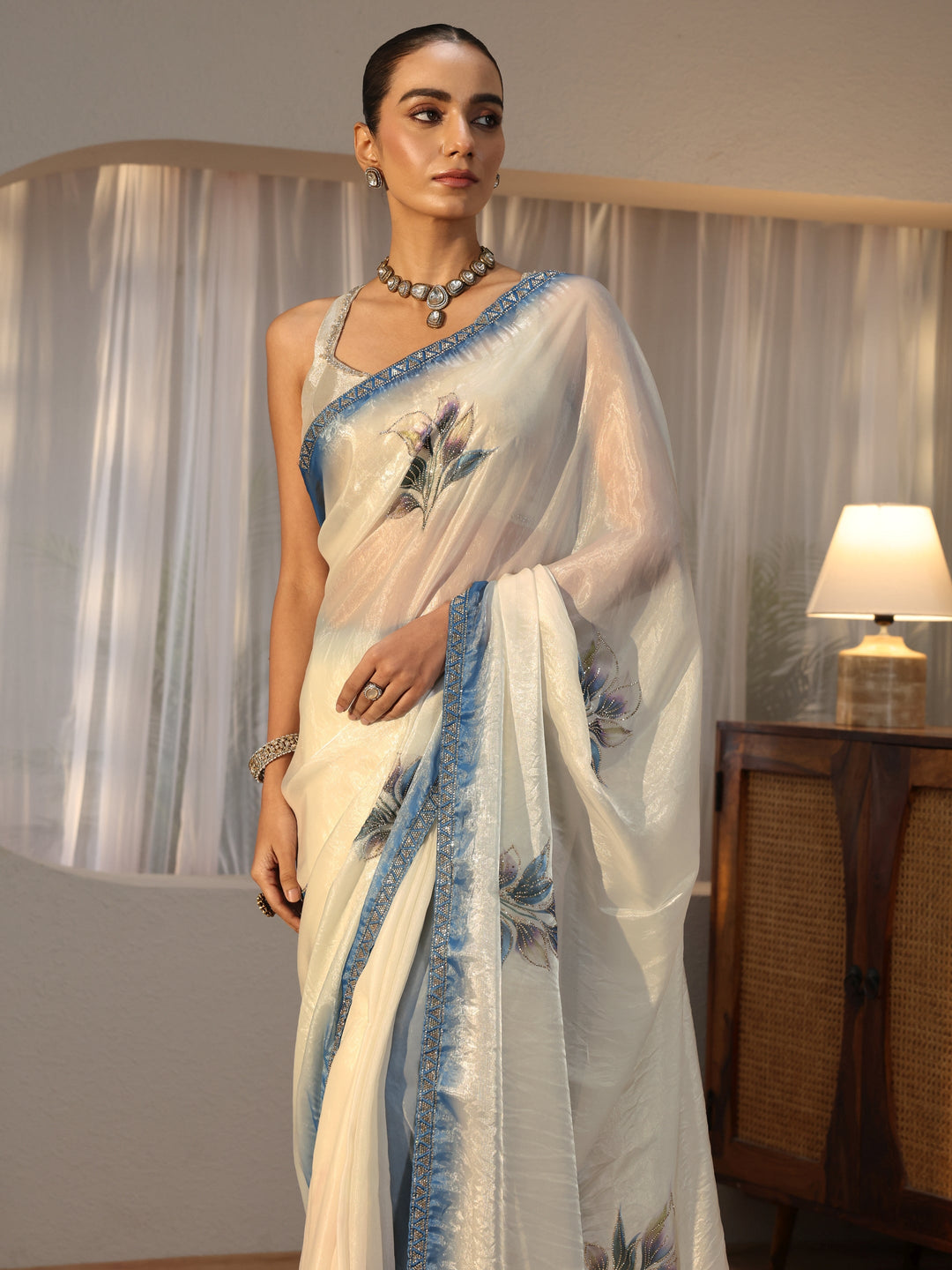  Cream Floral Printed Tissue Saree with Embellishments 