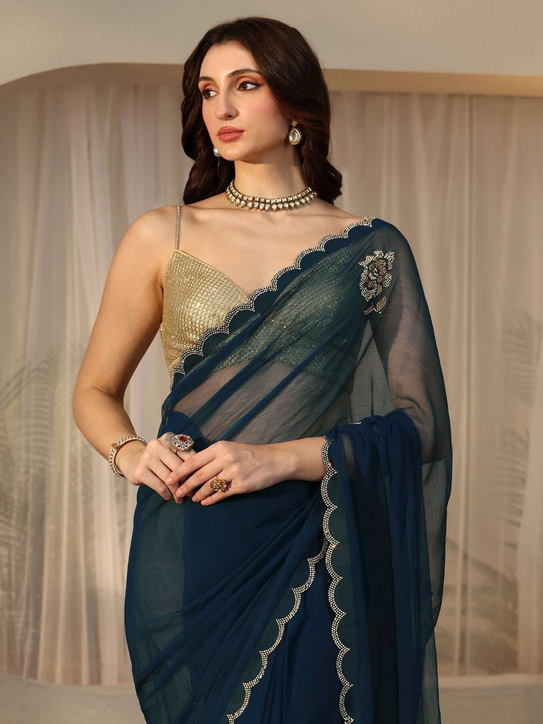  Peacock Blue Floral Embellished Georgette Saree 