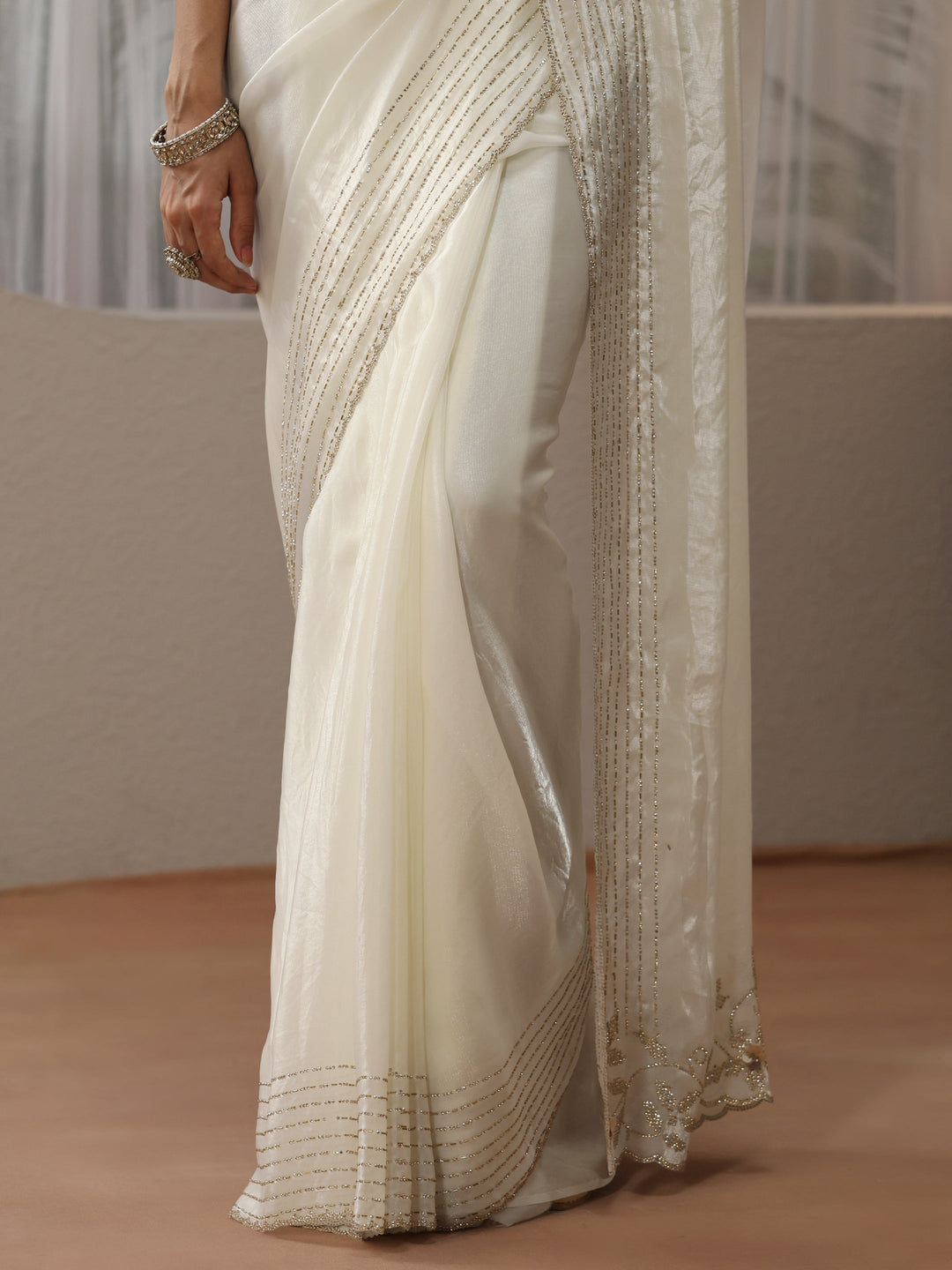  Cream Silk Blend Saree with Embellished Border 