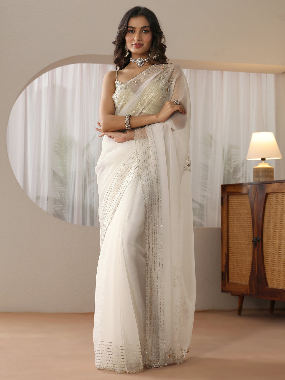  Cream Georgette Saree with Embellished Border 