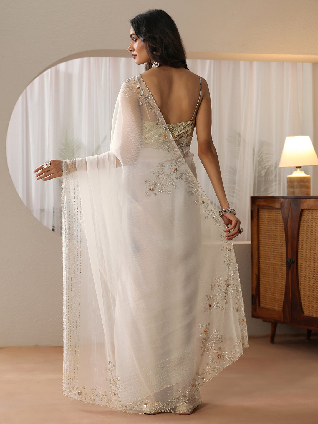  Cream Georgette Saree with Embellished Border 