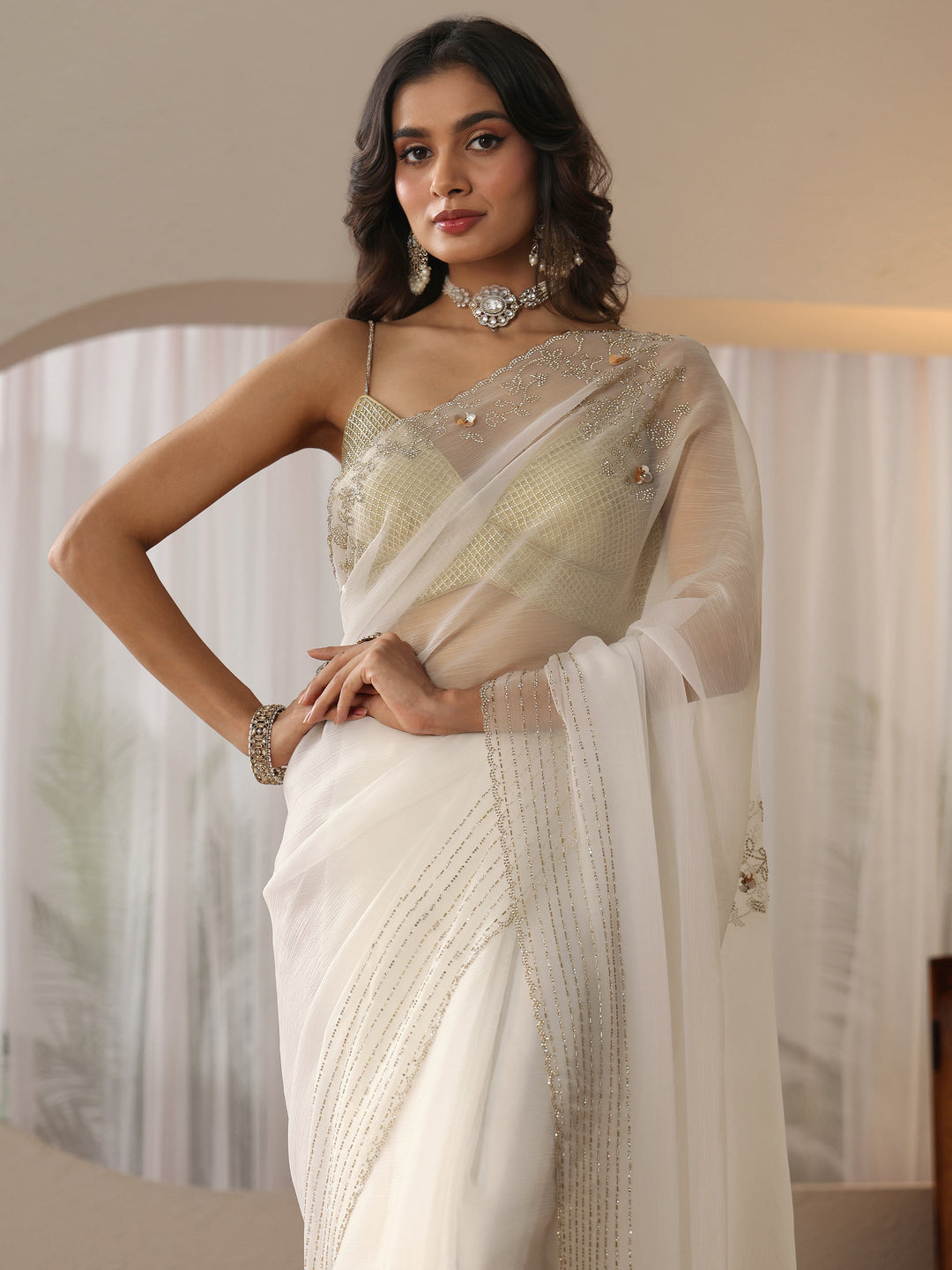  Cream Georgette Saree with Embellished Border 