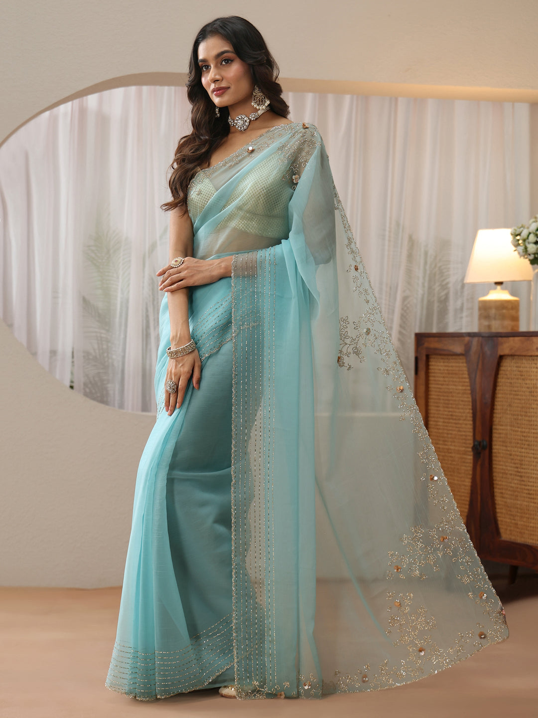  Sky Blue Georgette Saree with Embellished Border 
