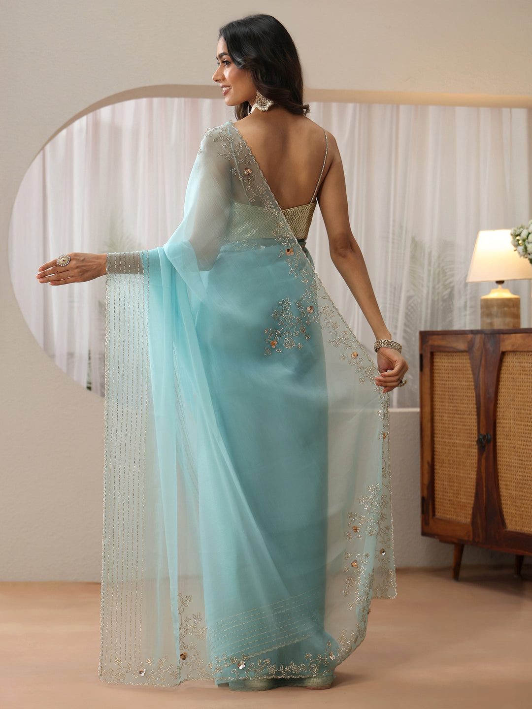  Sky Blue Georgette Saree with Embellished Border 