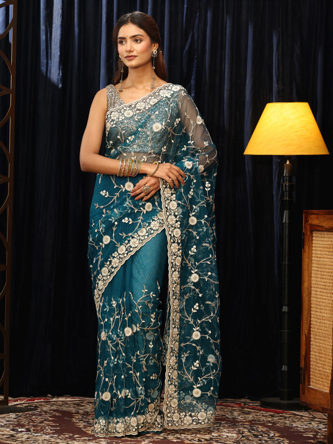  Teal Blue Floral Embroidered Net Saree 