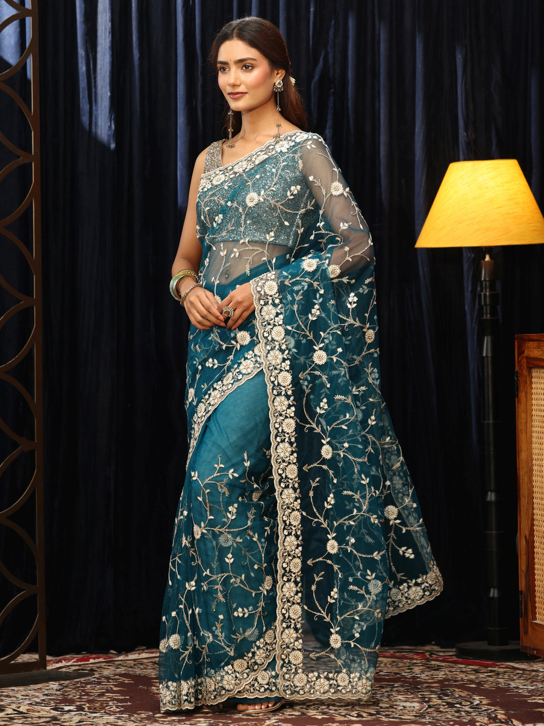  Teal Blue Floral Embroidered Net Saree 