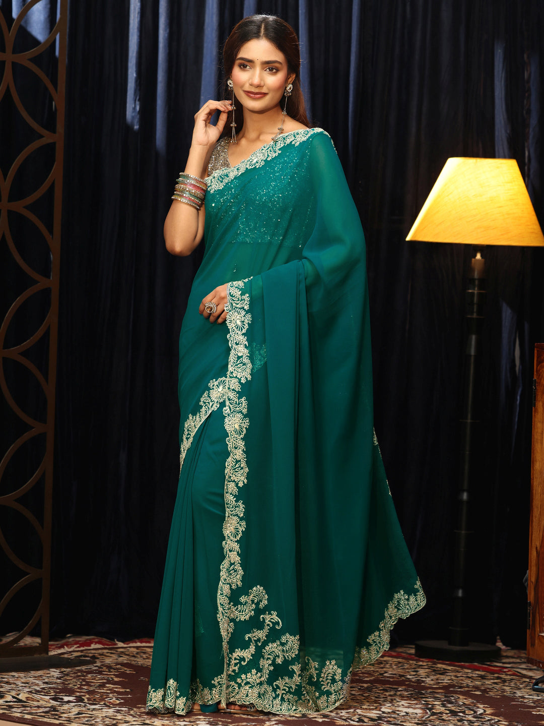  Teal Green Georgette Saree with Embroidered Border 