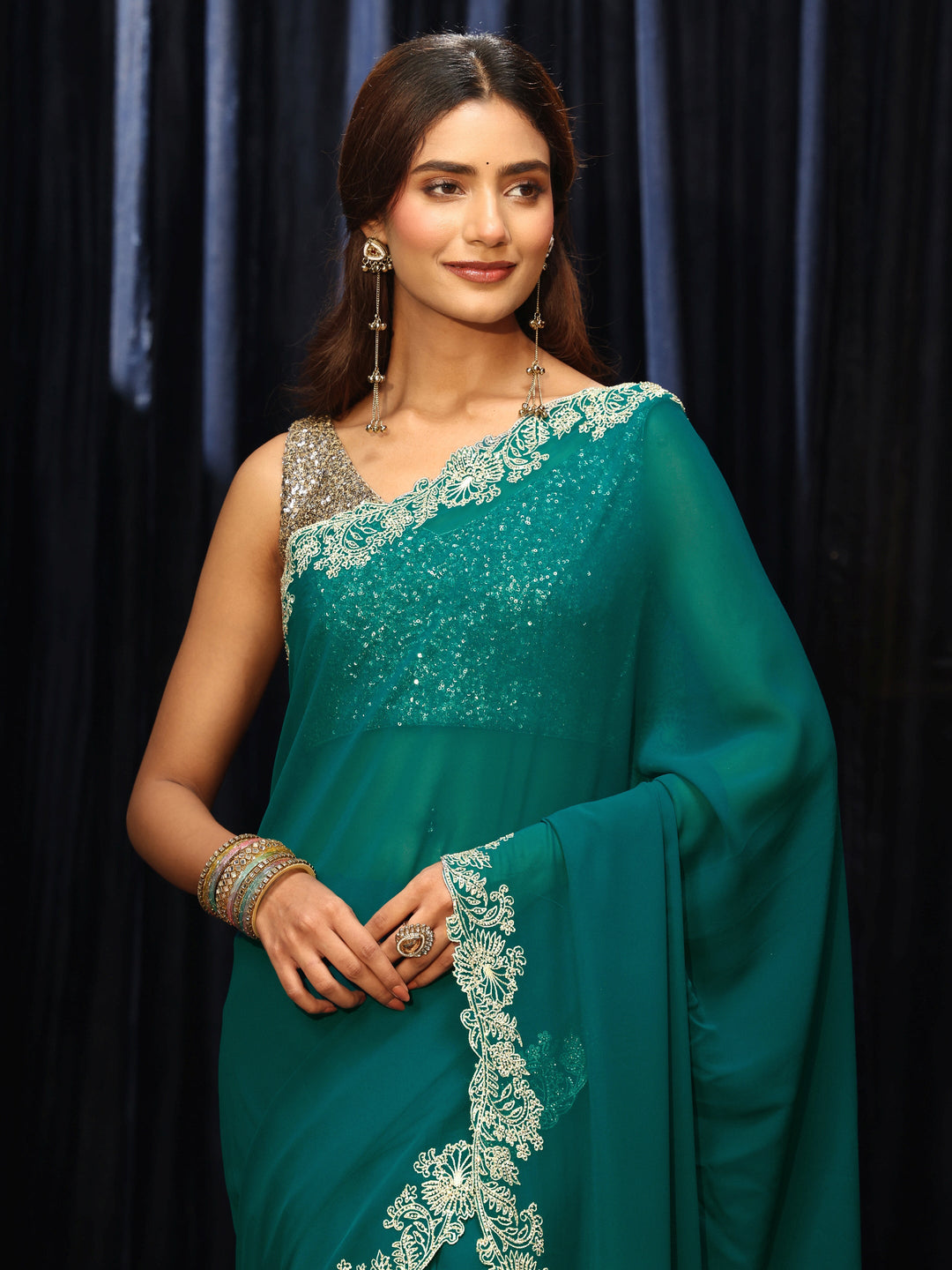 Teal Green Georgette Saree with Embroidered Border 