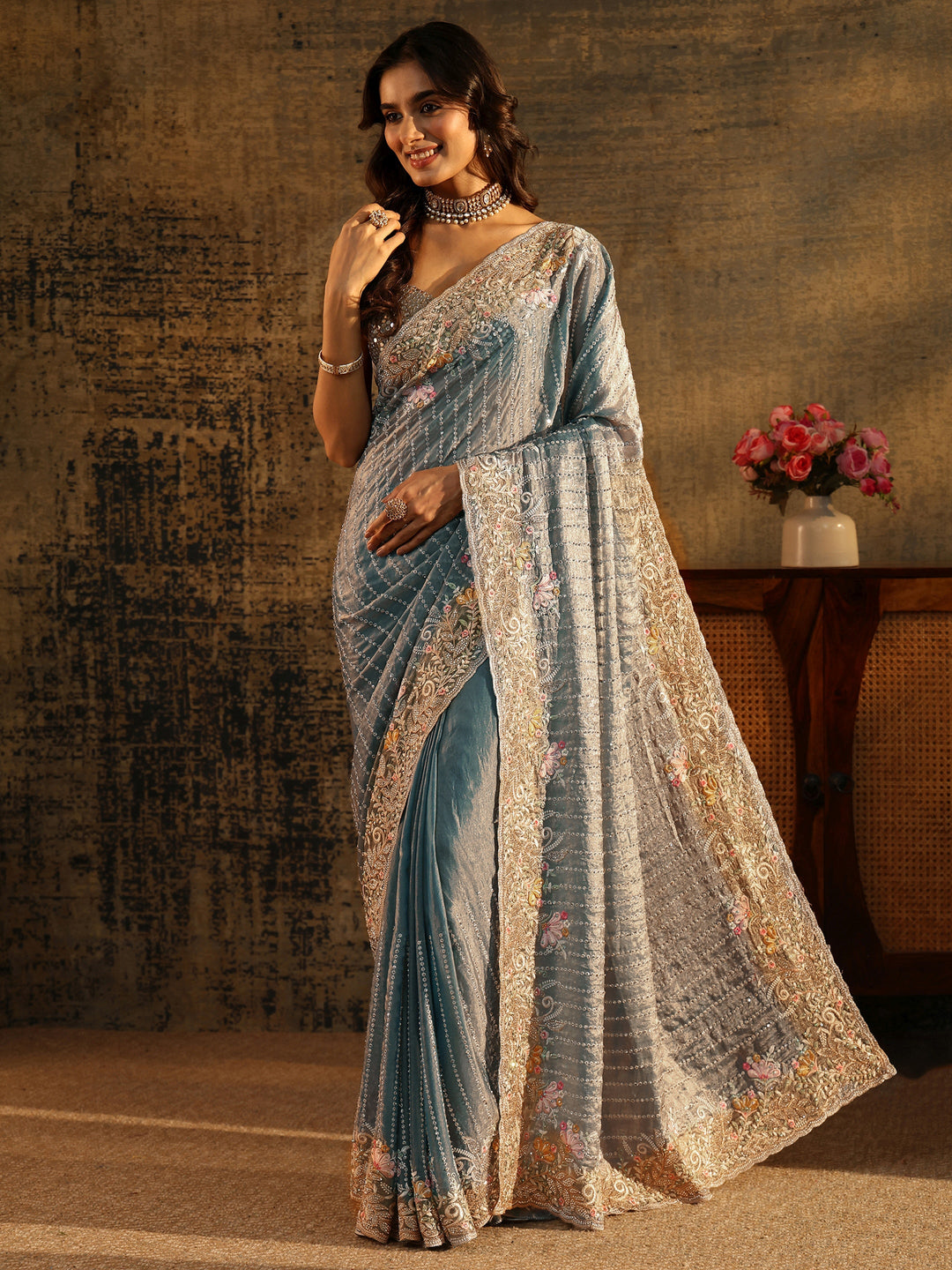  Libas Art Powder Blue Embellished Tissue Saree with Floral Border 