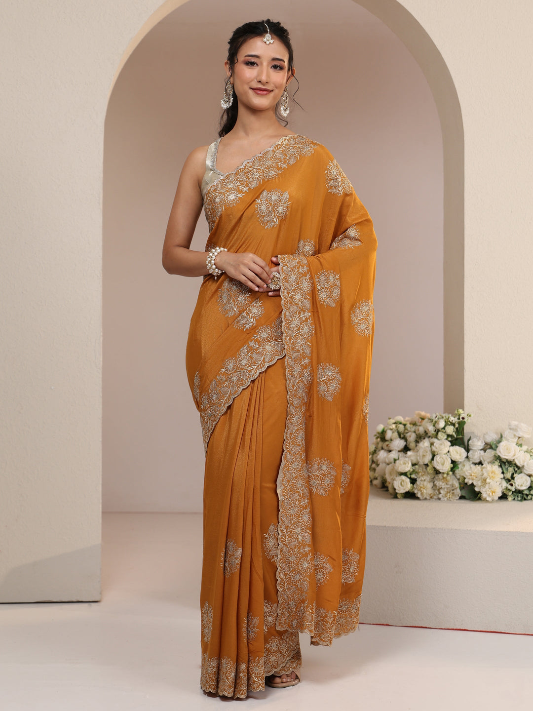  Libas Burnt Orange Satin Saree with Embroidered Floral Motifs 