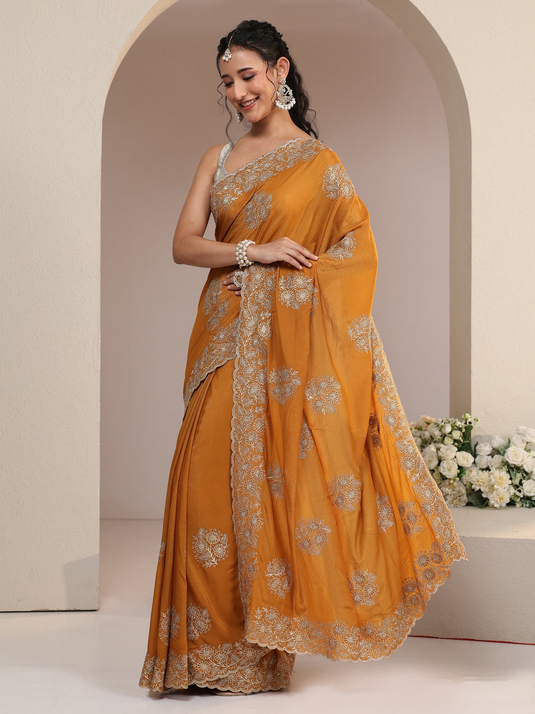  Libas Burnt Orange Satin Saree with Embroidered Floral Motifs 