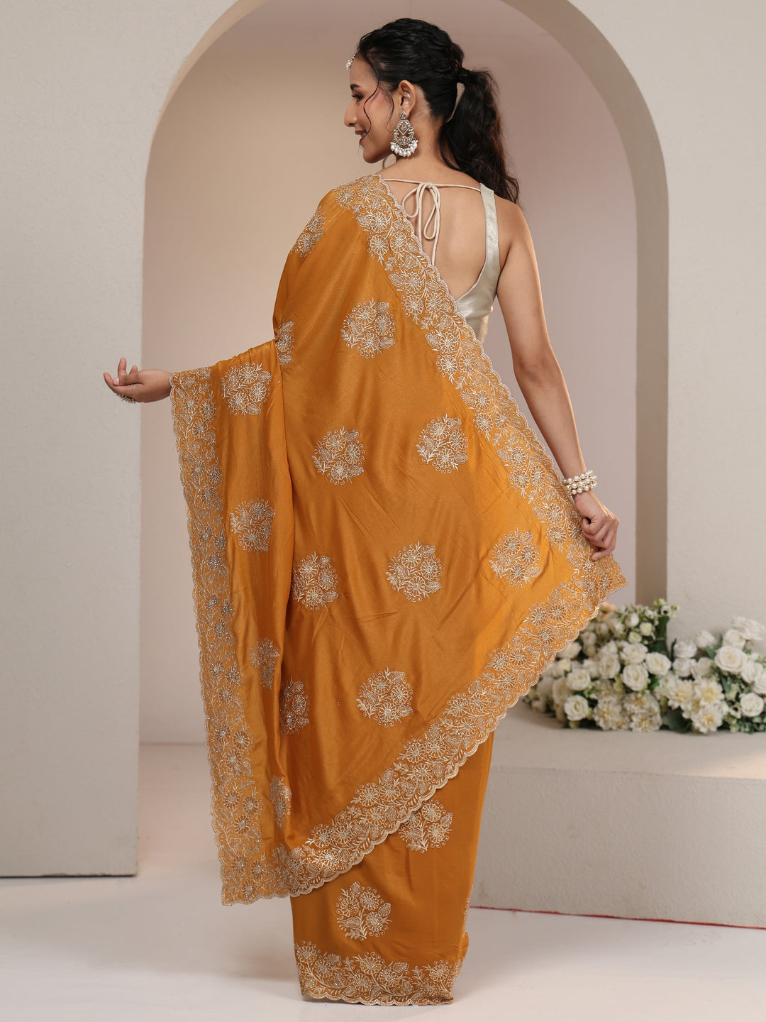  Libas Burnt Orange Satin Saree with Embroidered Floral Motifs 