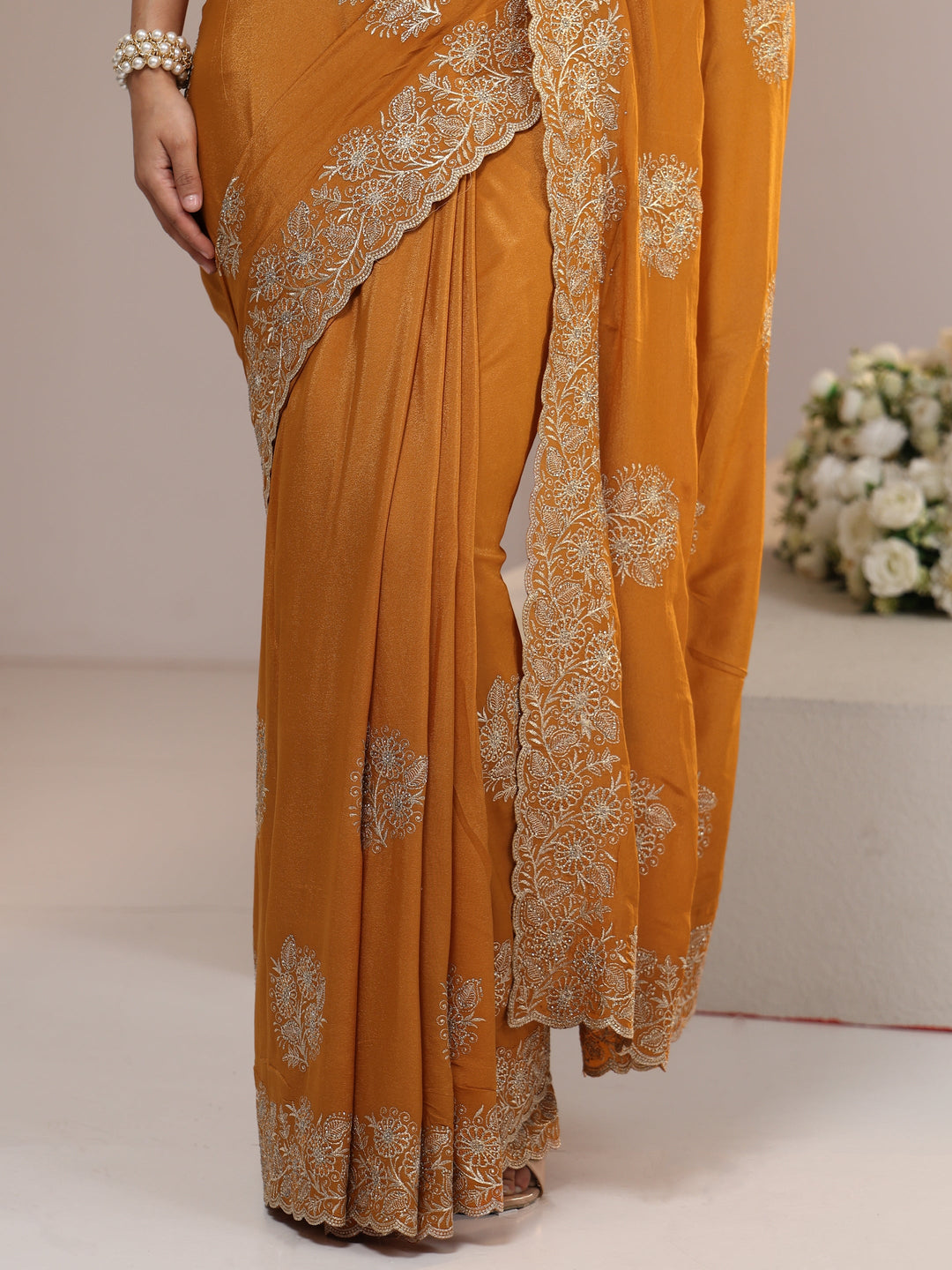  Libas Burnt Orange Satin Saree with Embroidered Floral Motifs 