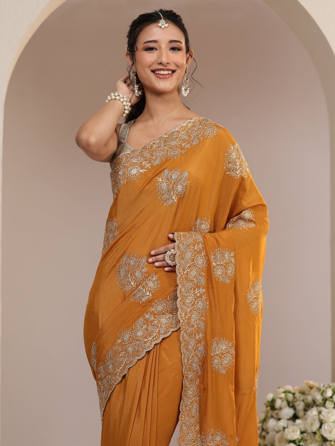  Libas Burnt Orange Satin Saree with Embroidered Floral Motifs 
