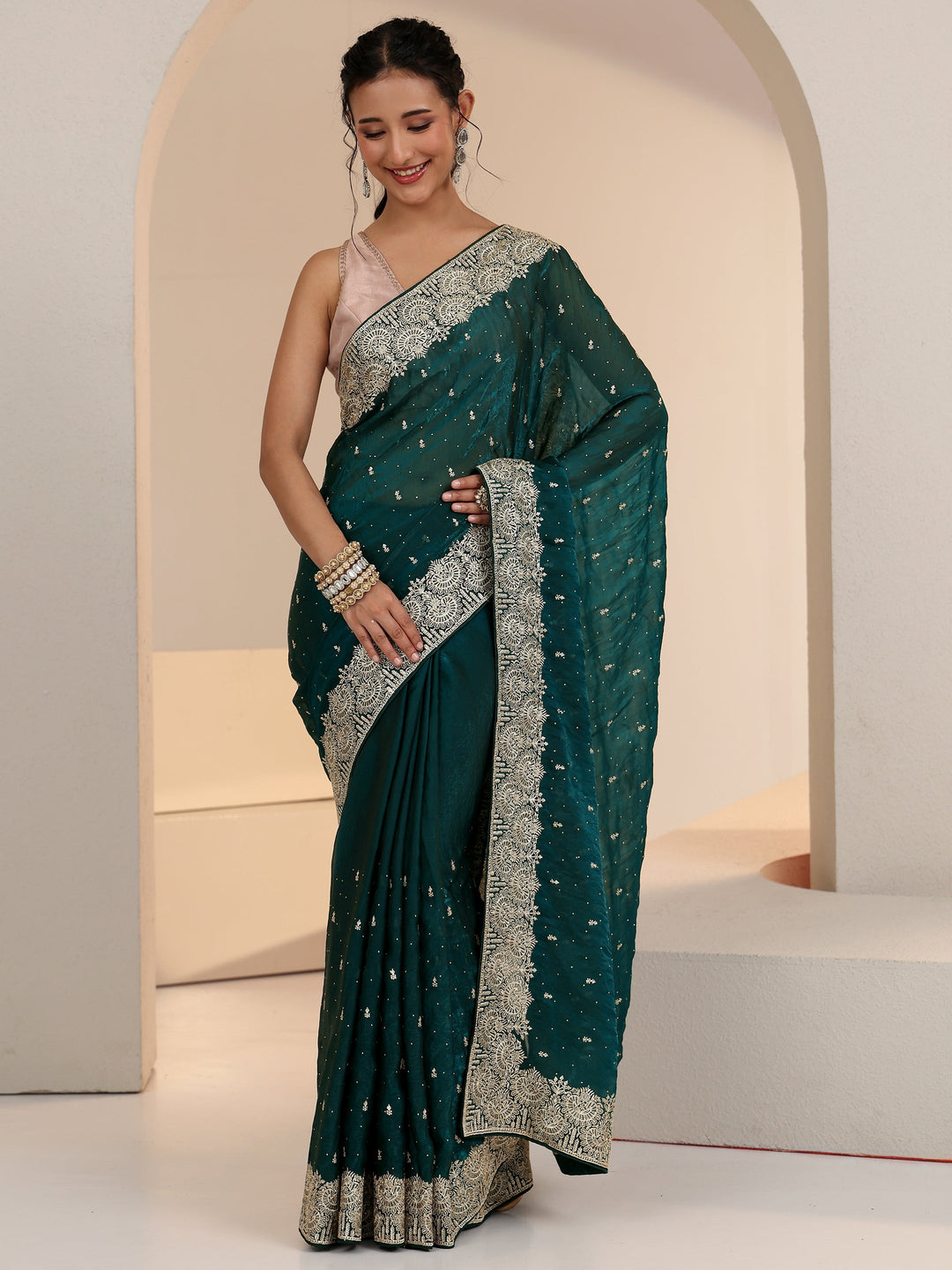  Libas Teal Green Embellished Tissue Saree 