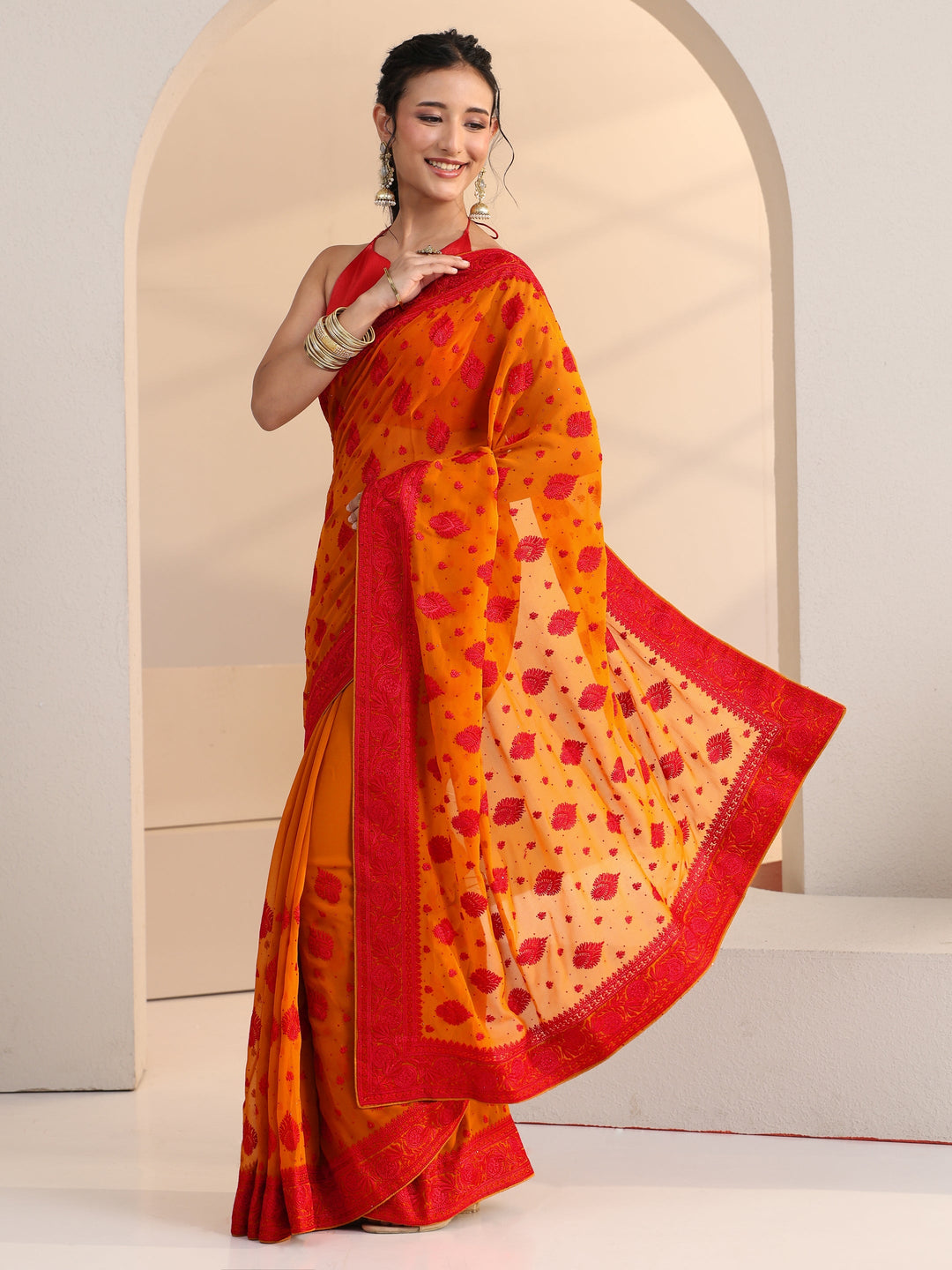  Libas Pulp Orange Georgette Saree with Embroidered Border 
