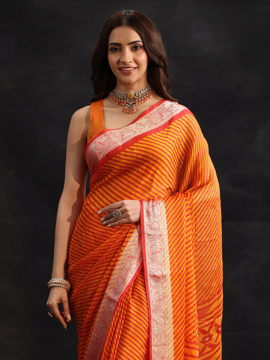  Libas Orange Striped Chiffon Saree with Paisley Border 