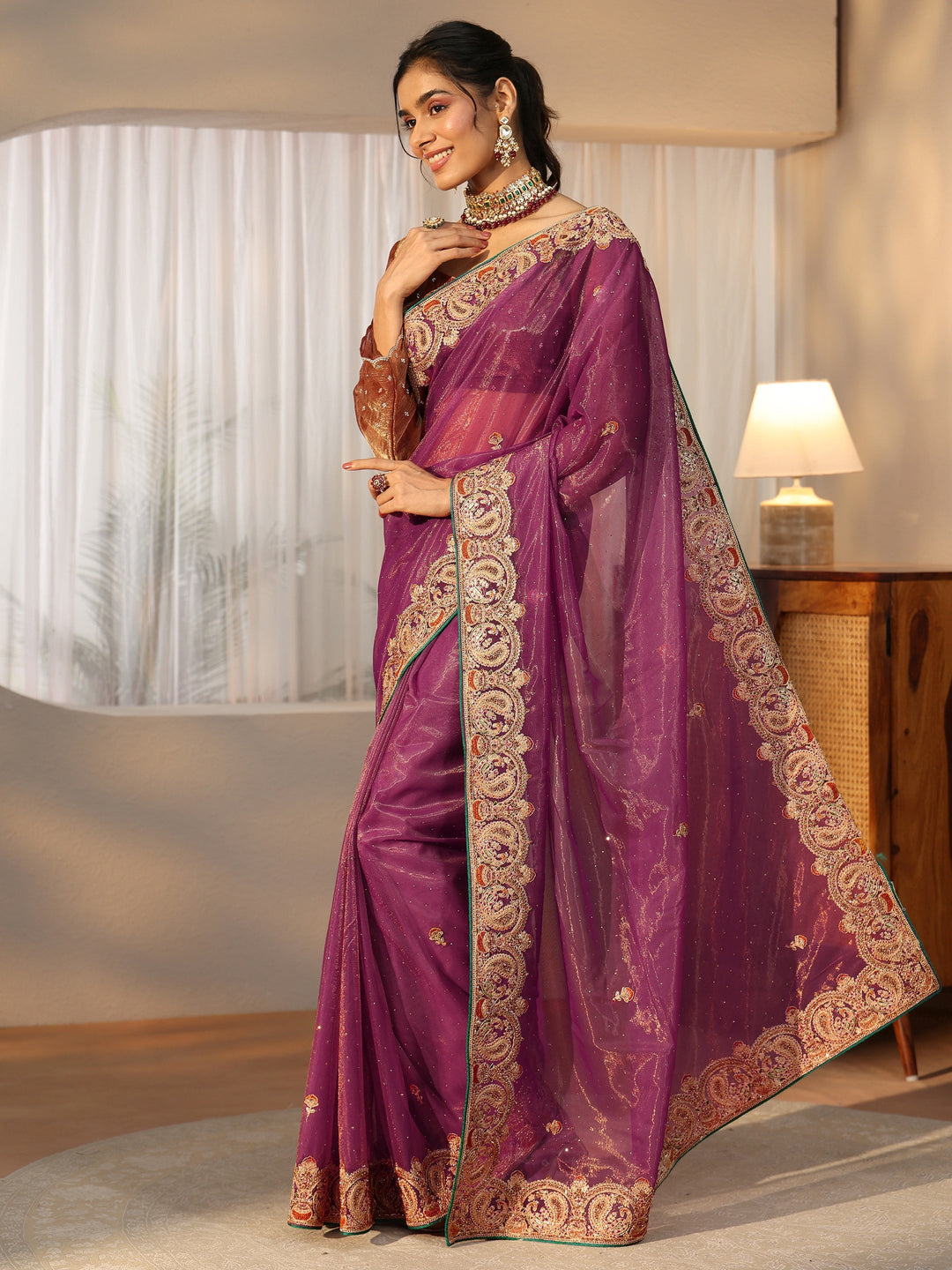  Libas Plum Purple Net Saree with Embellished Paisley Border 