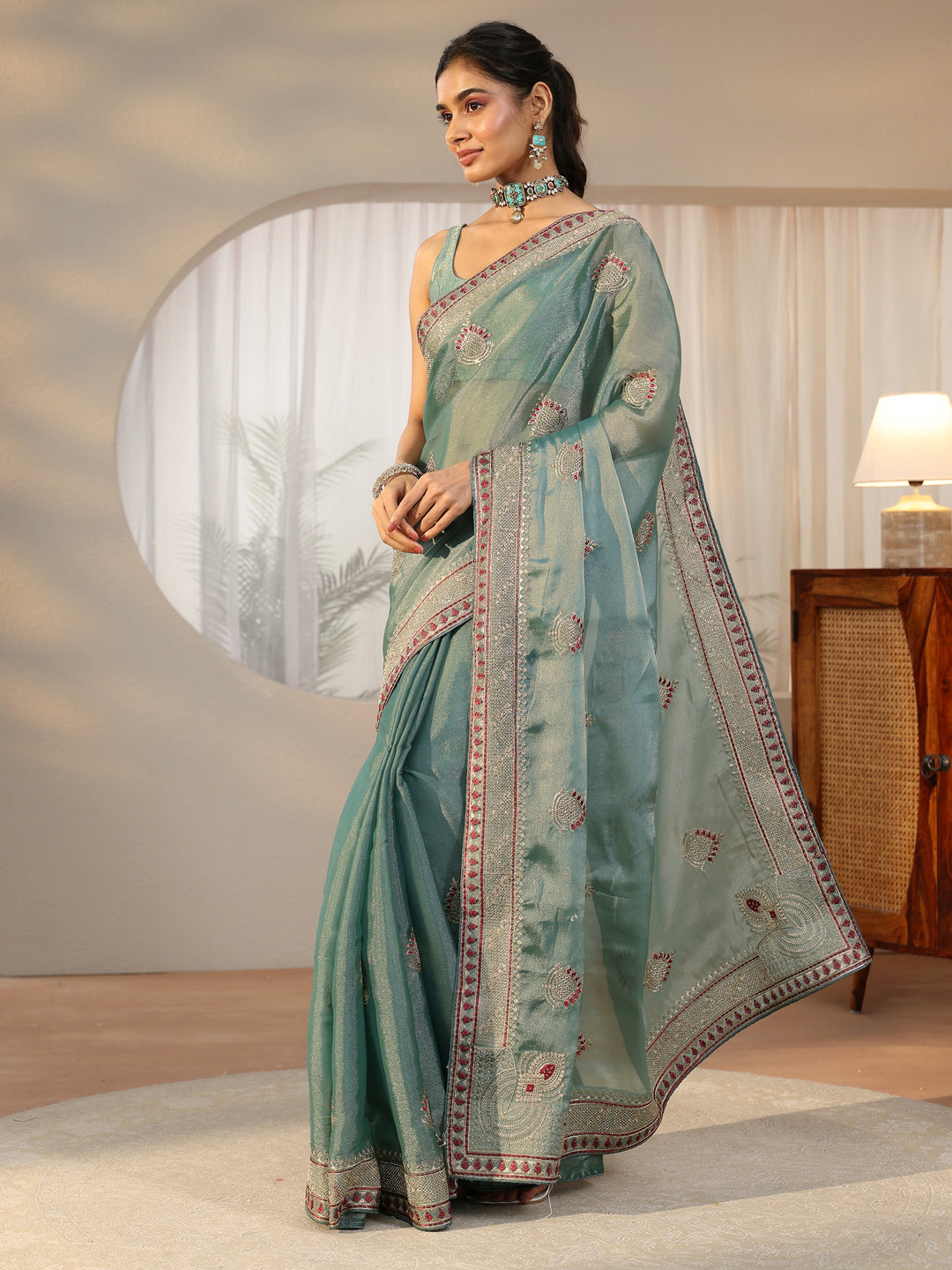  Libas Sea Green Embellished Tissue saree 
