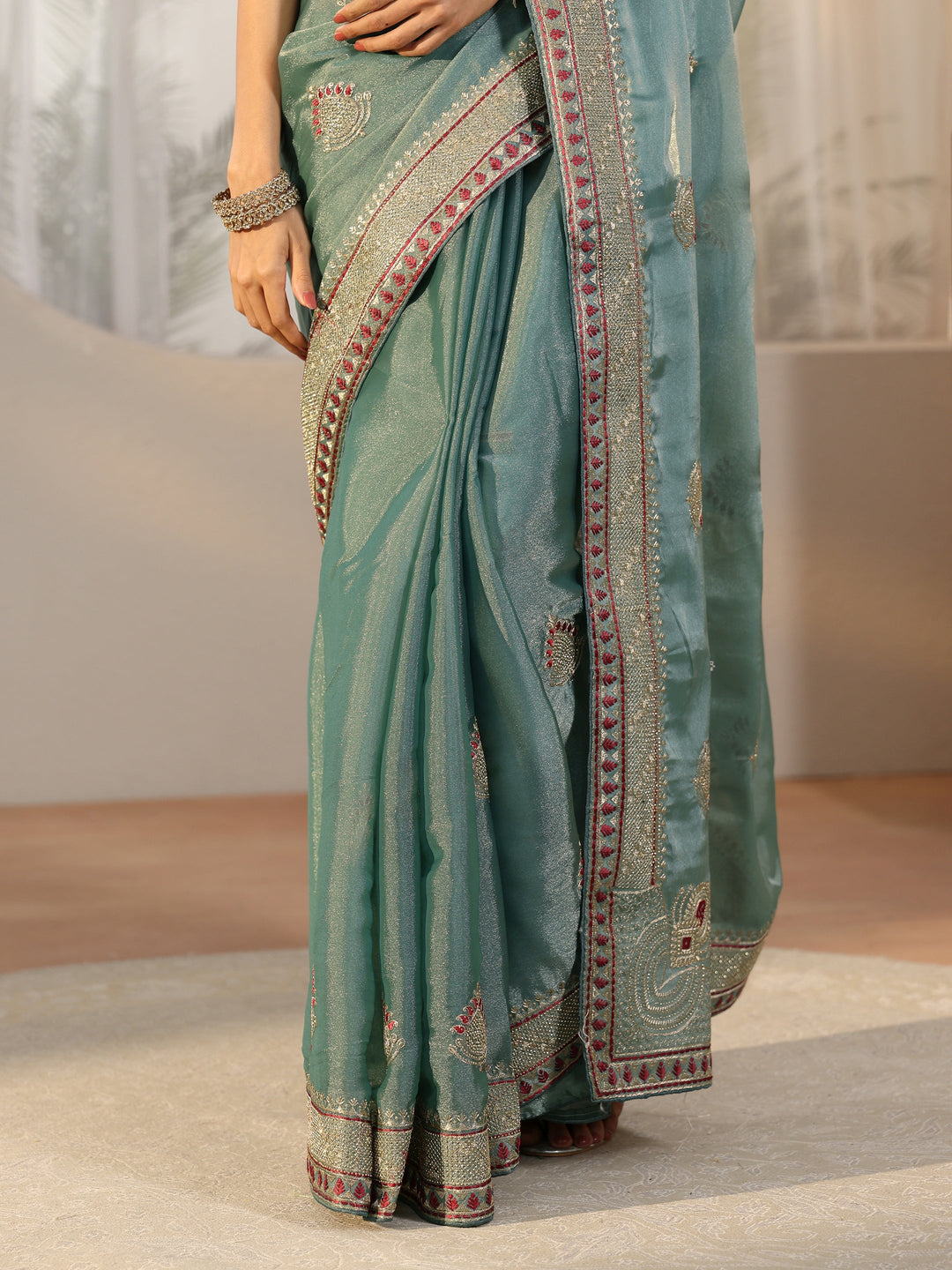  Libas Sea Green Embellished Tissue saree 