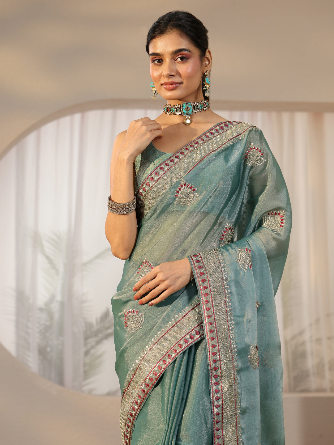  Libas Sea Green Embellished Tissue saree 