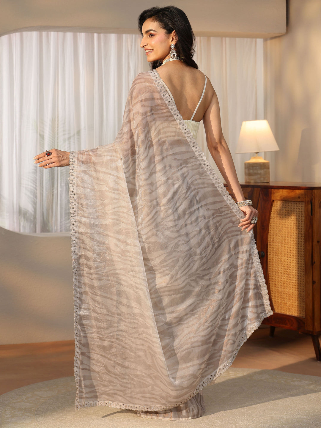 Libas Off White Wavy Textured Tissue Saree 