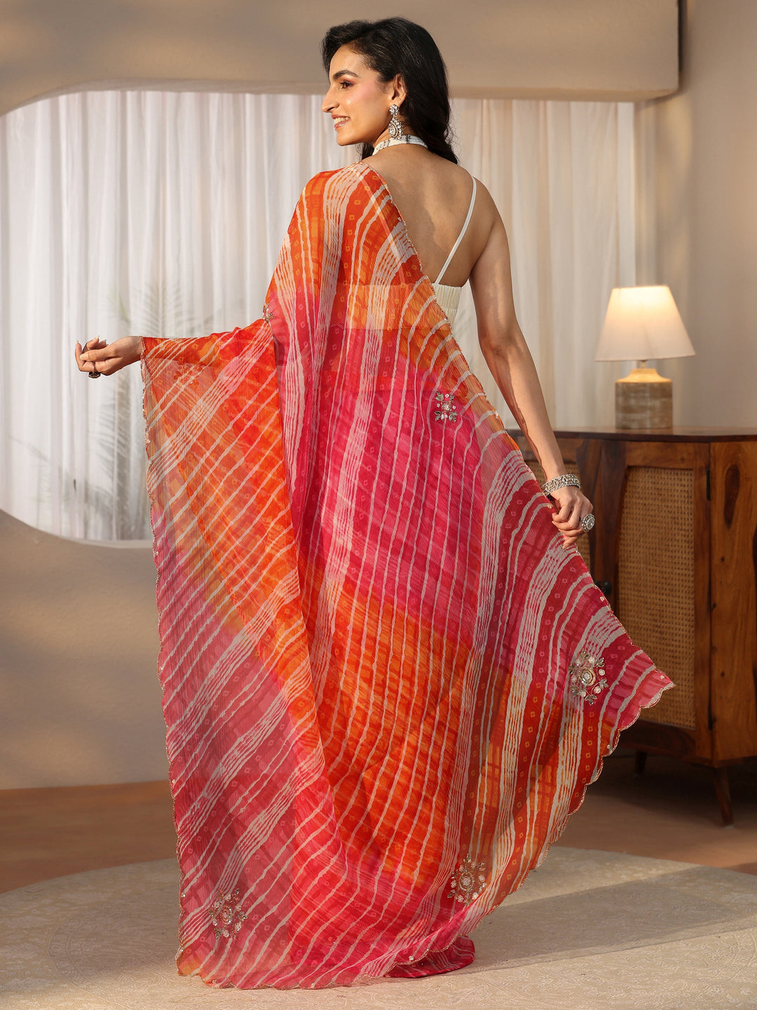  Libas Orange Leheriya Printed Chiffon Saree 