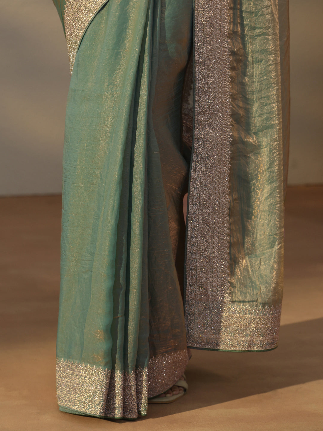  Libas Green Tissue Saree with Embellished Border 