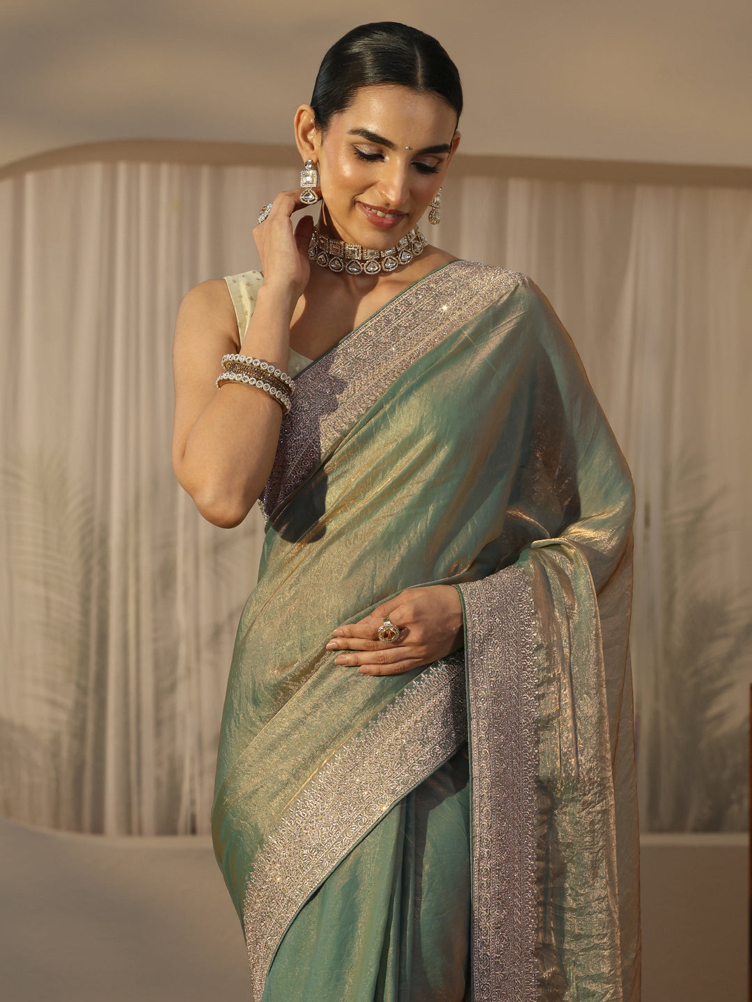  Libas Green Tissue Saree with Embellished Border 