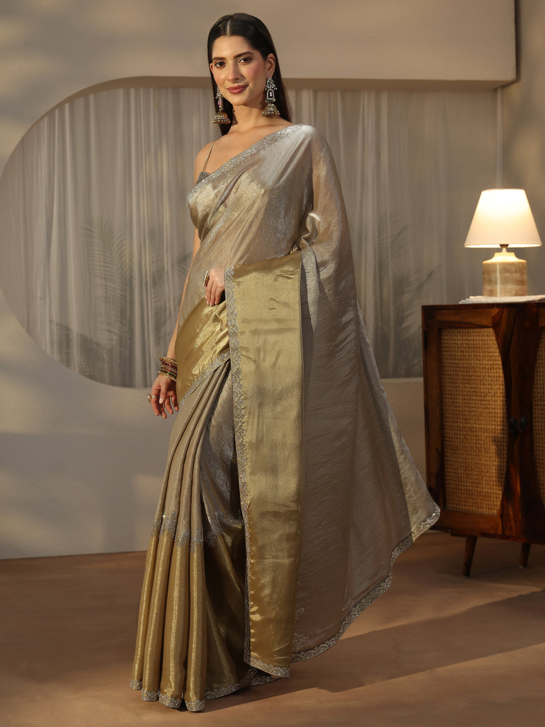  Libas Golden Tissue Saree with Embellished Border 