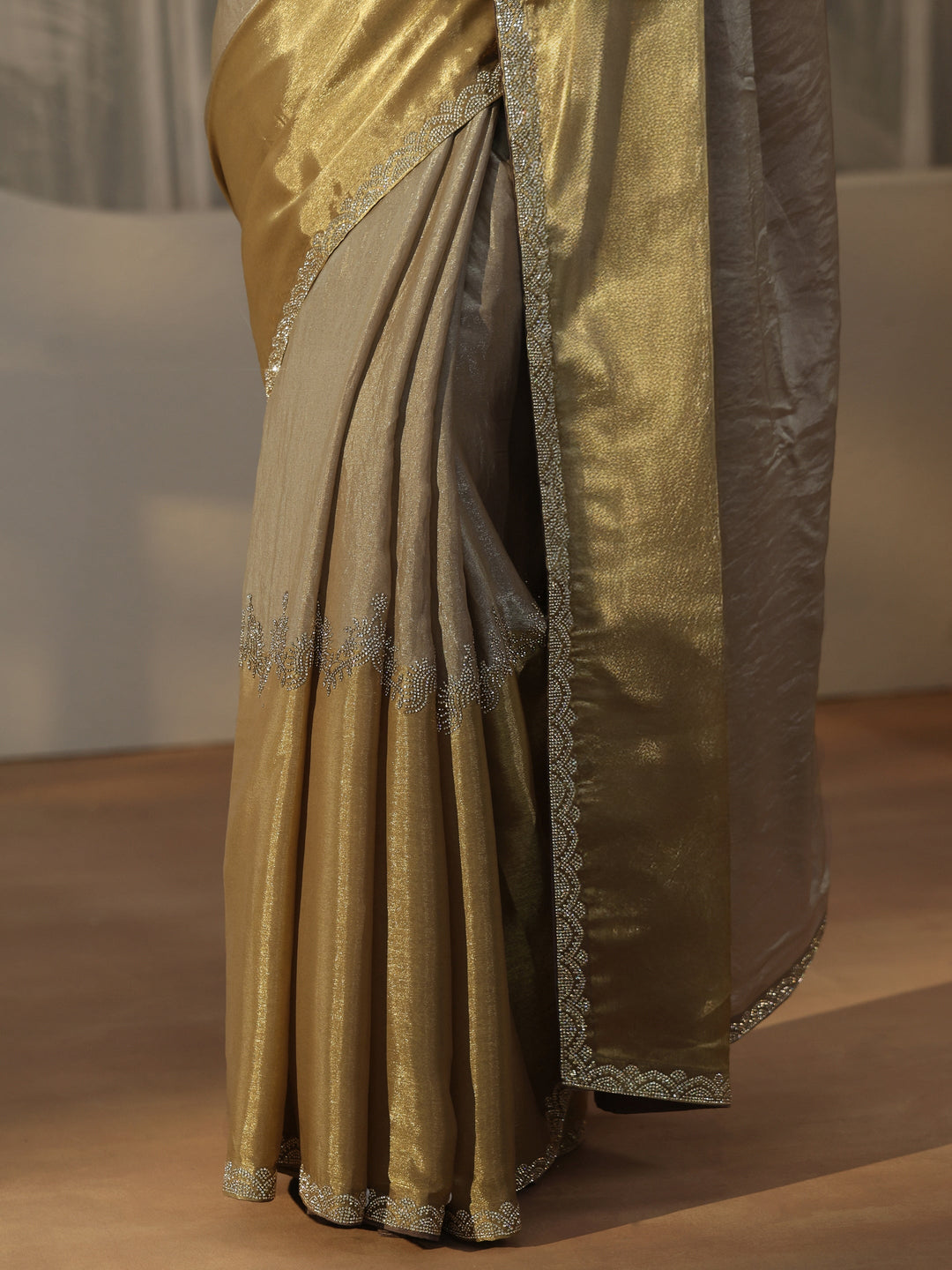  Libas Golden Tissue Saree with Embellished Border 