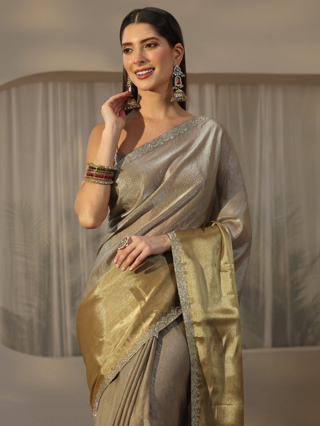  Libas Golden Tissue Saree with Embellished Border 