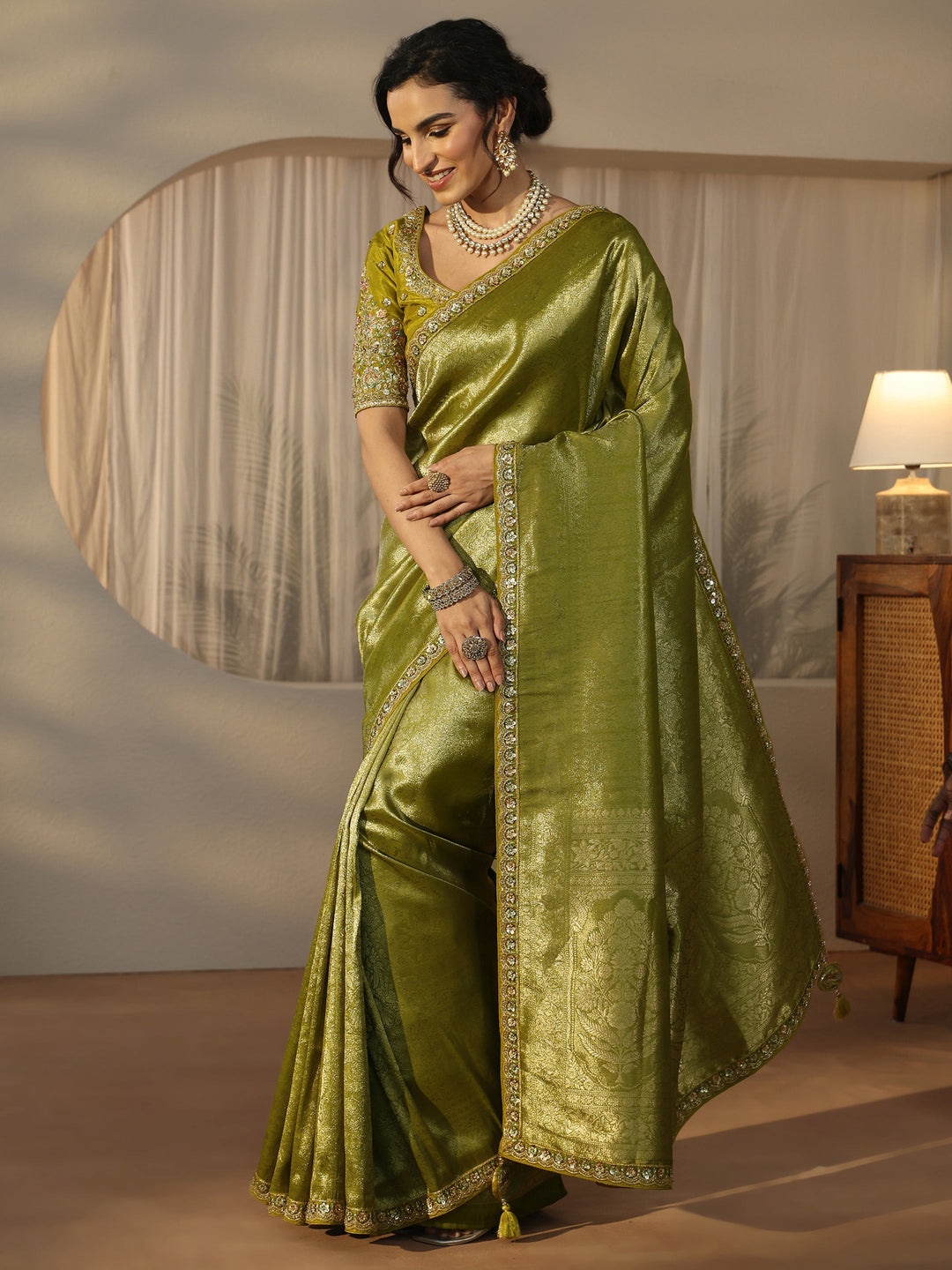  Libas Art Green Textured Silk Blend Saree with Embellished Border 
