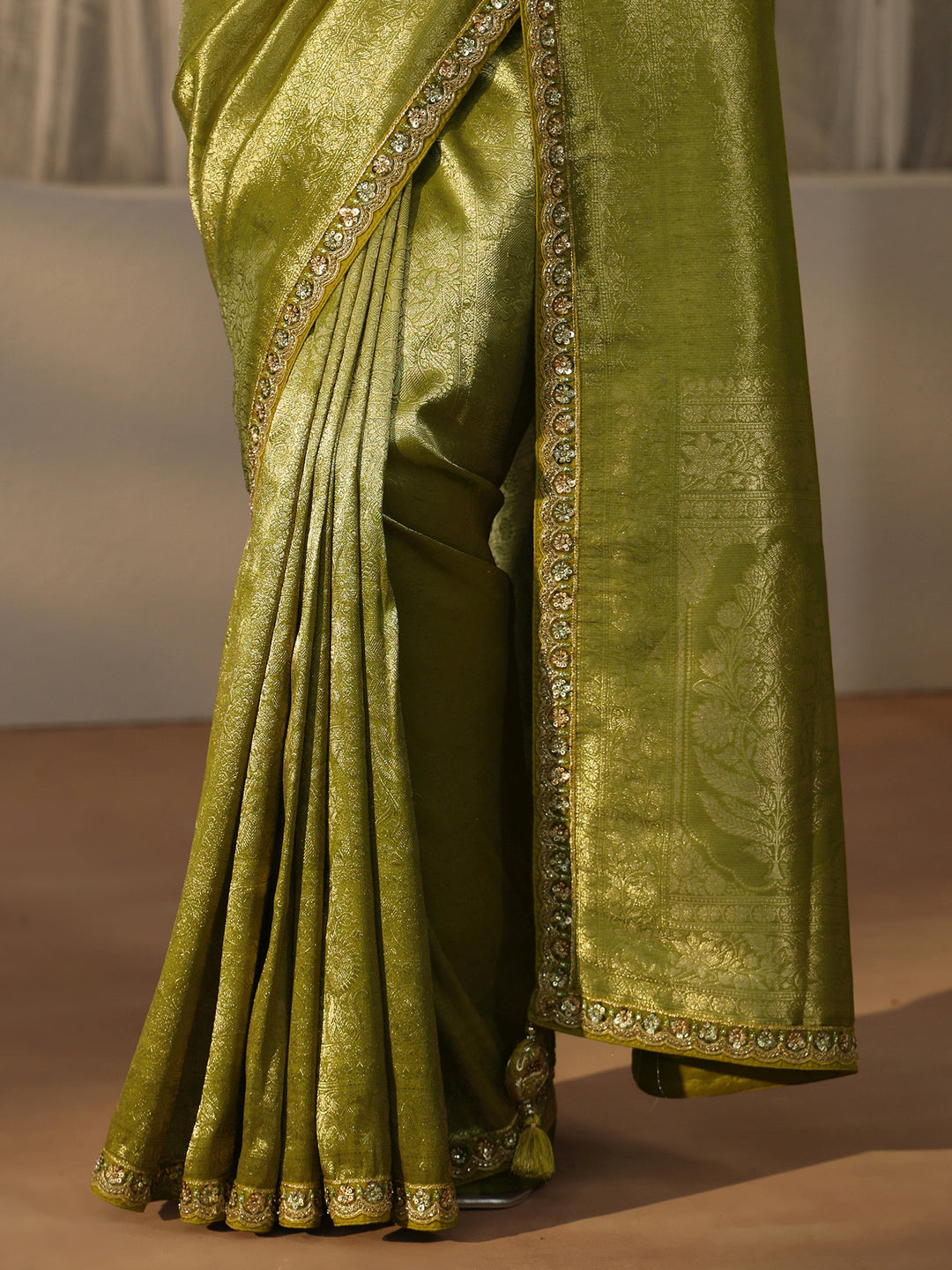  Libas Art Green Textured Silk Blend Saree with Embellished Border 