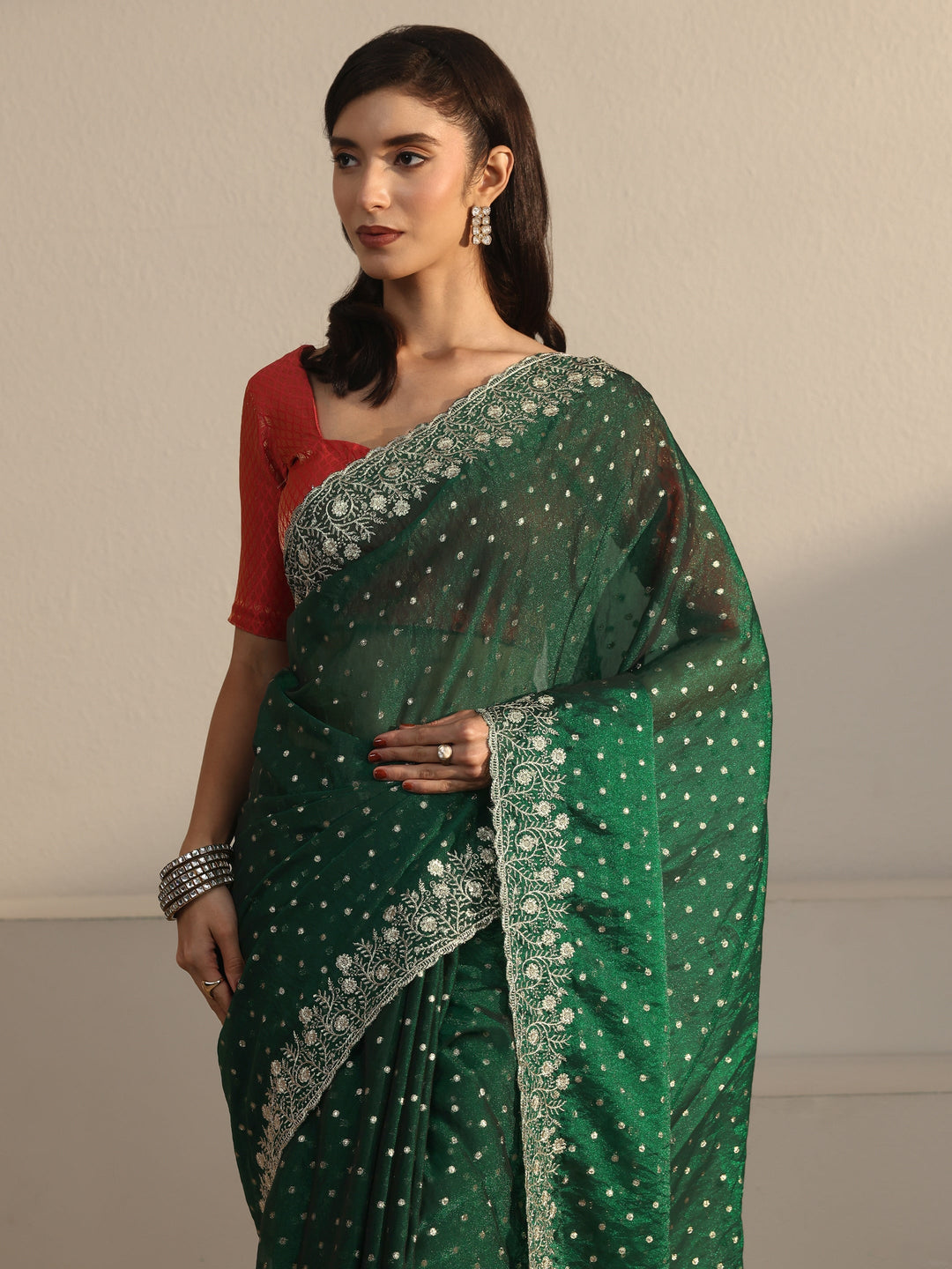  Libas Dark Green Woven Design Tissue Saree with Floral Border 